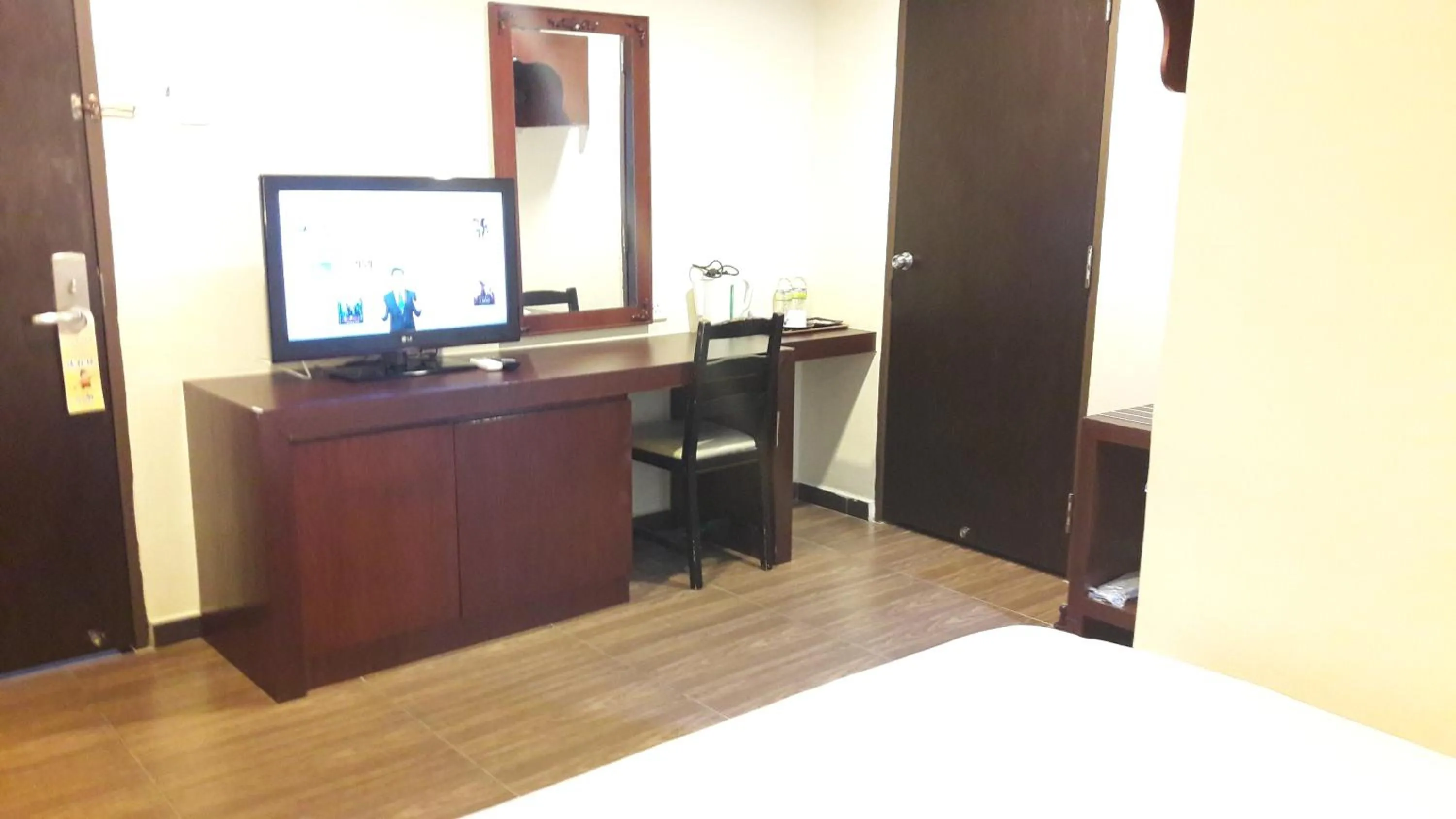 Bed in Cheng Ho Hotel