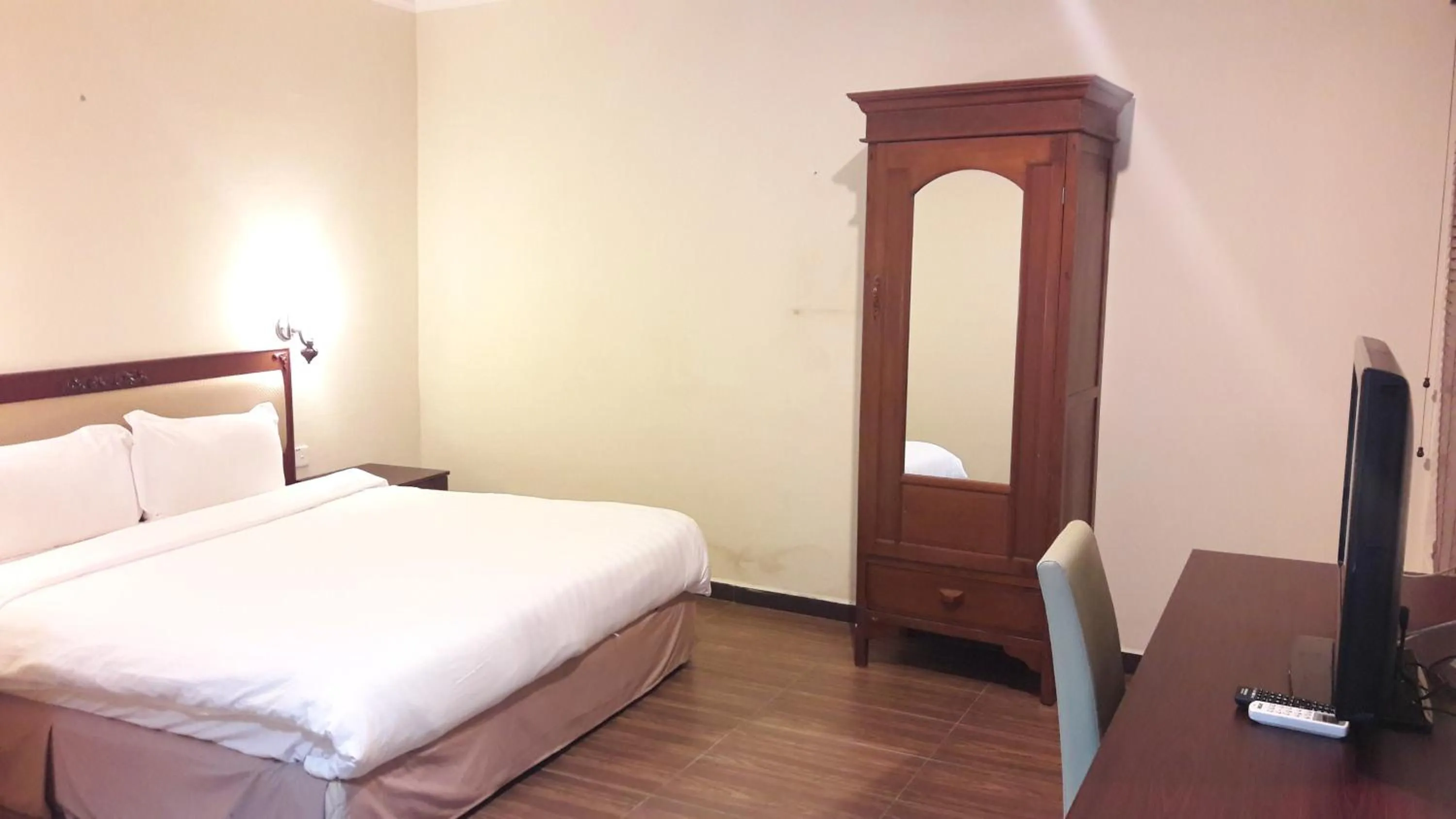 Bed in Cheng Ho Hotel