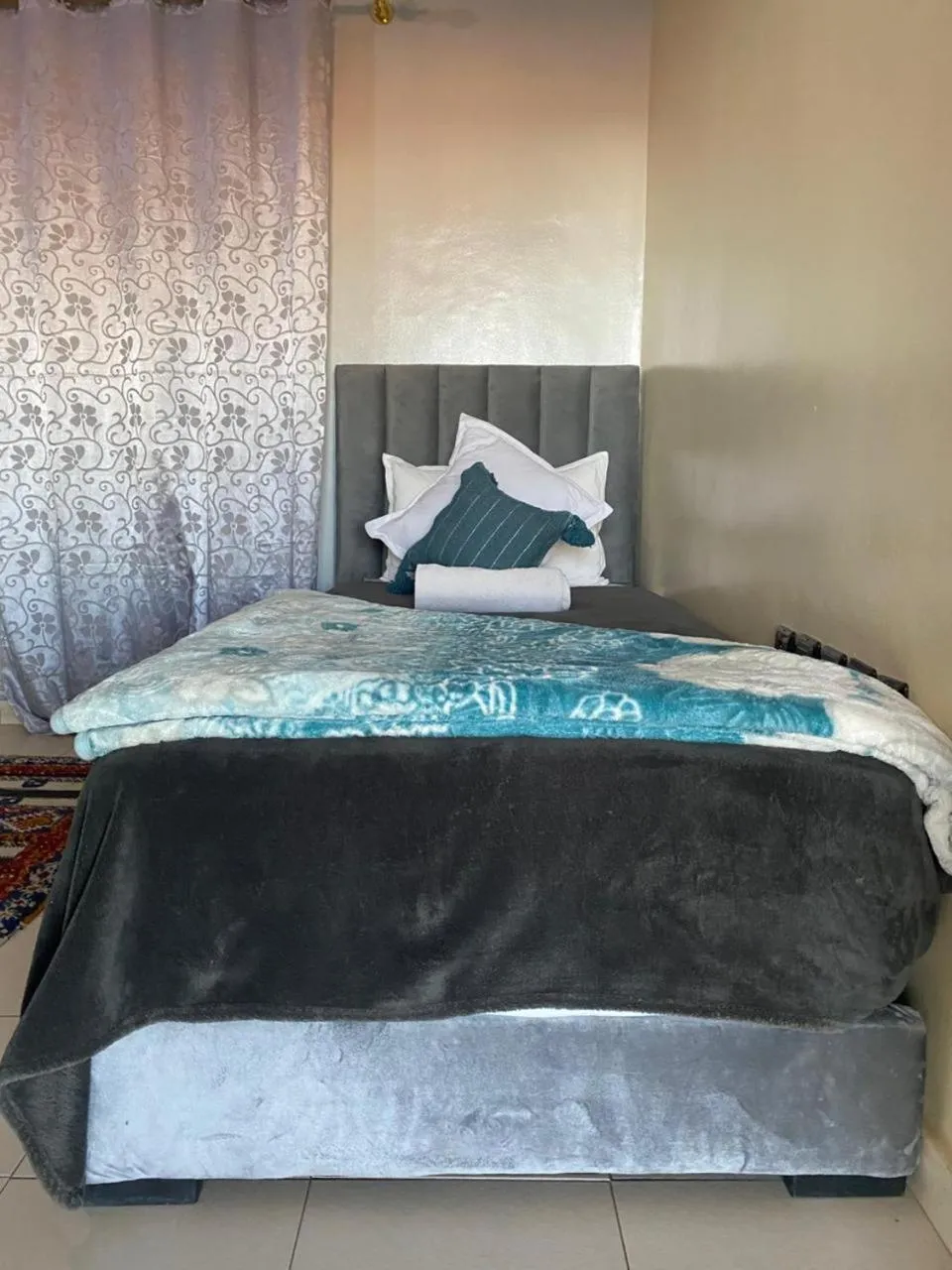 Bed in APPART AIGLE HOTEL