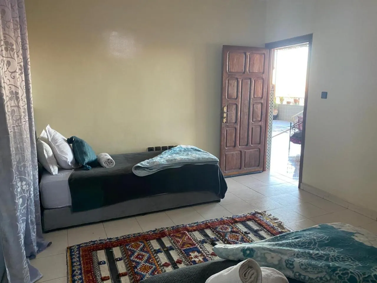 Bed in APPART AIGLE HOTEL