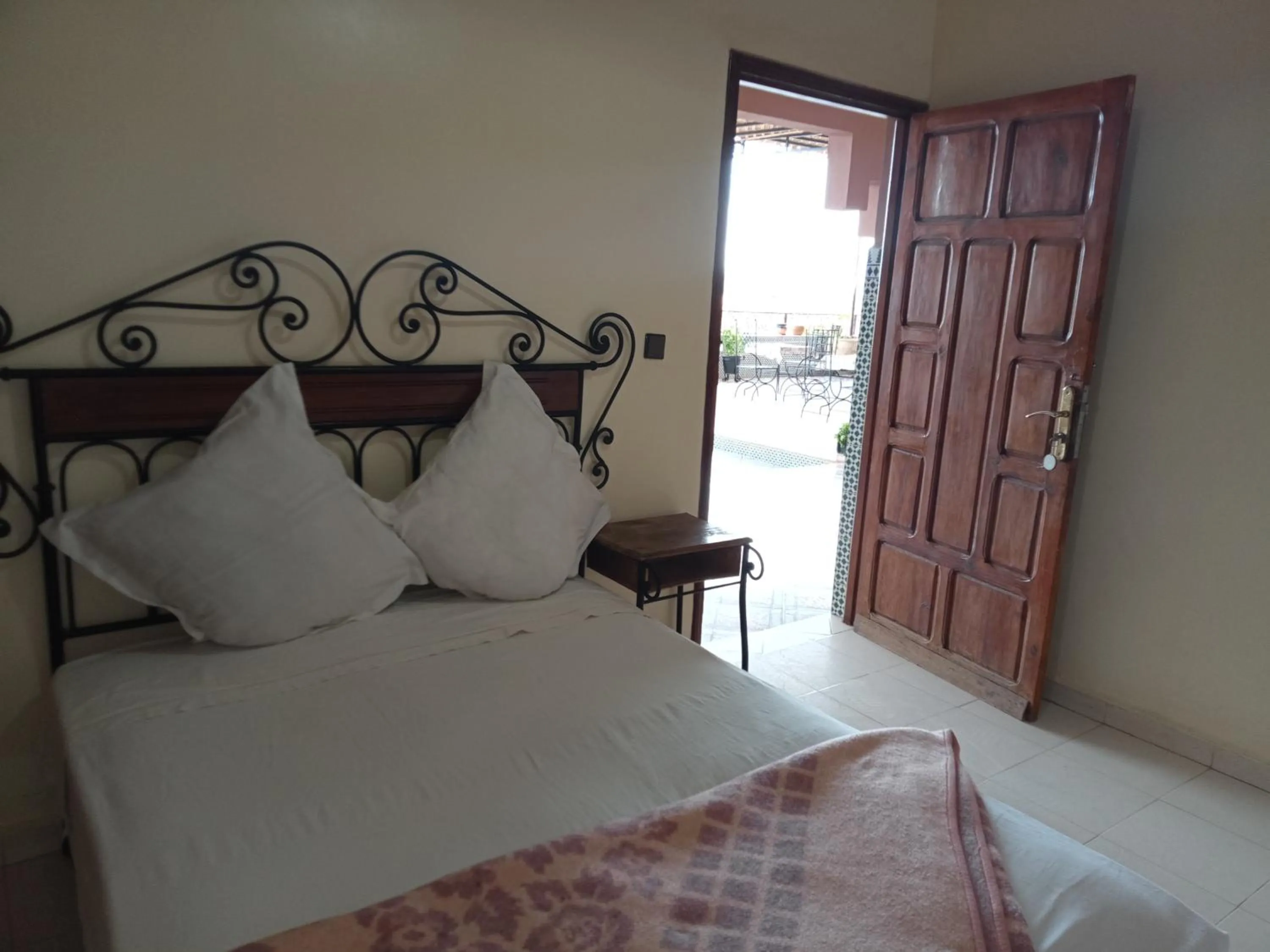 Bed in APPART AIGLE HOTEL