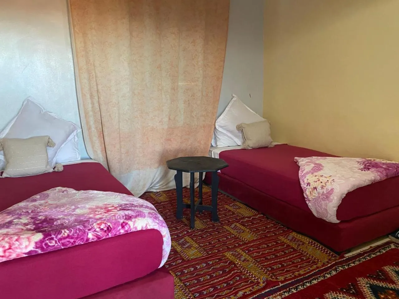 Bed in APPART AIGLE HOTEL