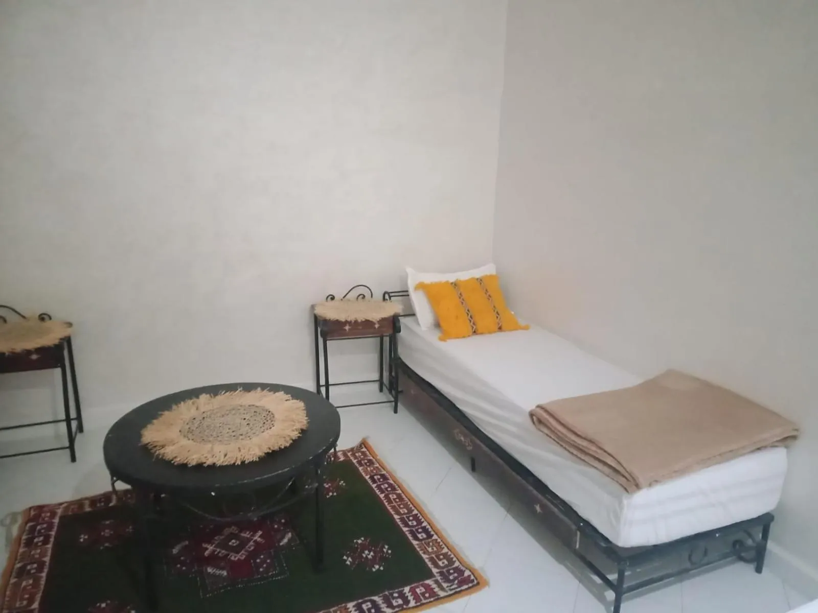 Bed in APPART AIGLE HOTEL