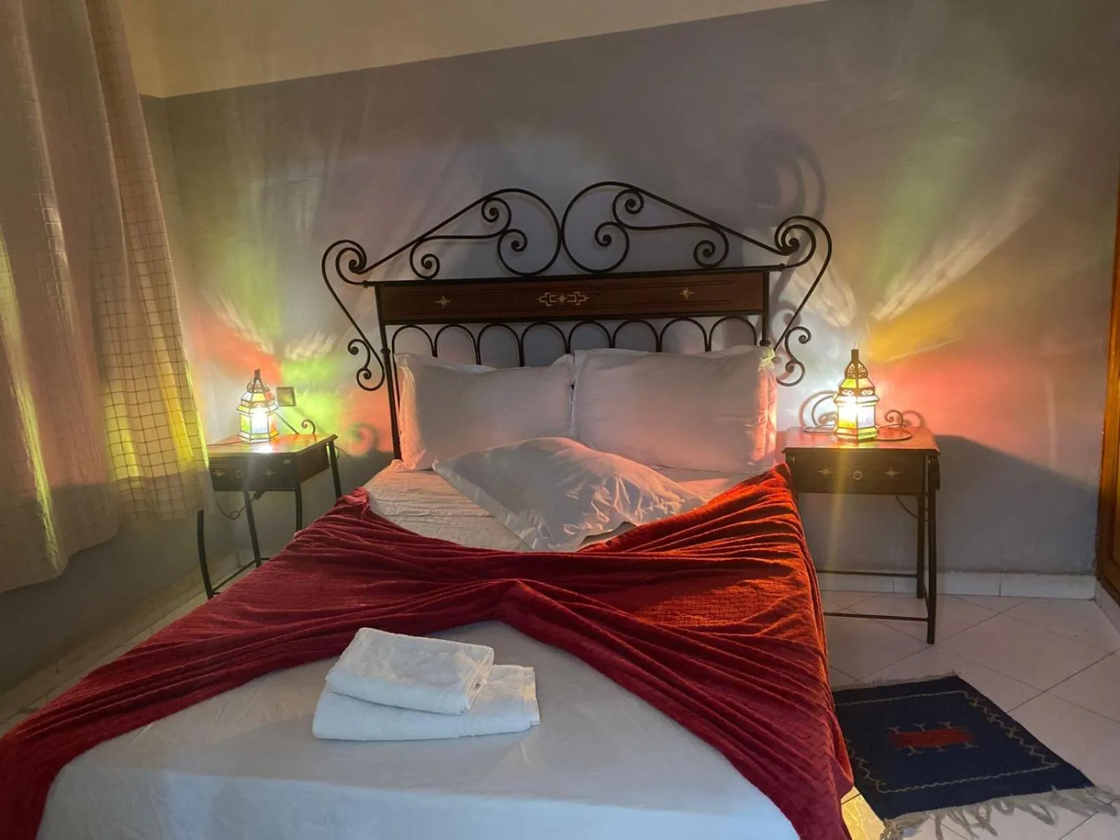 Bed in APPART AIGLE HOTEL