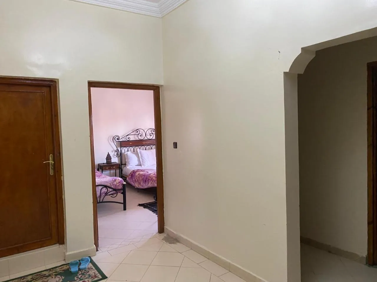 Bed in APPART AIGLE HOTEL