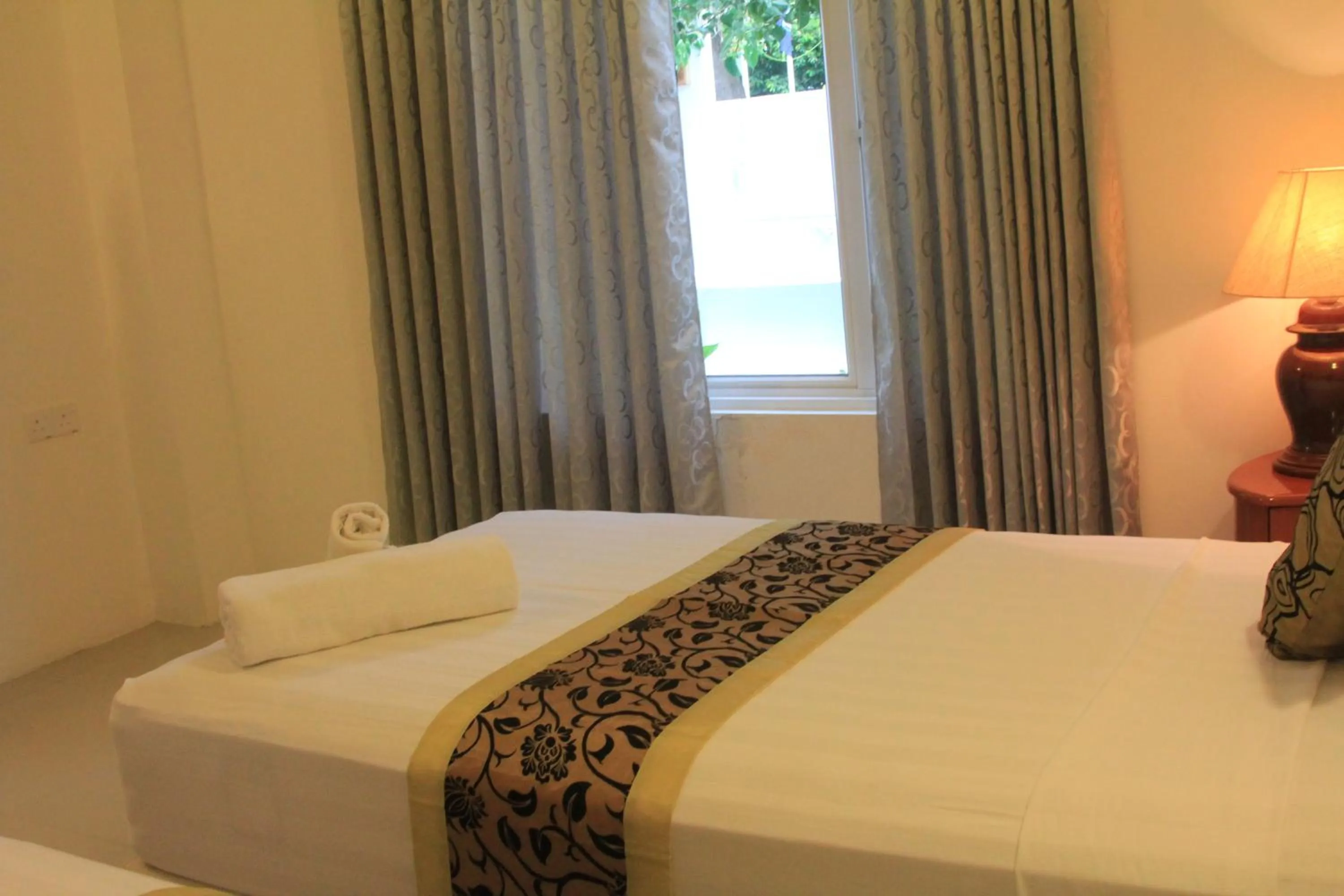 Garden view, Bed in Ras Rana Lodge