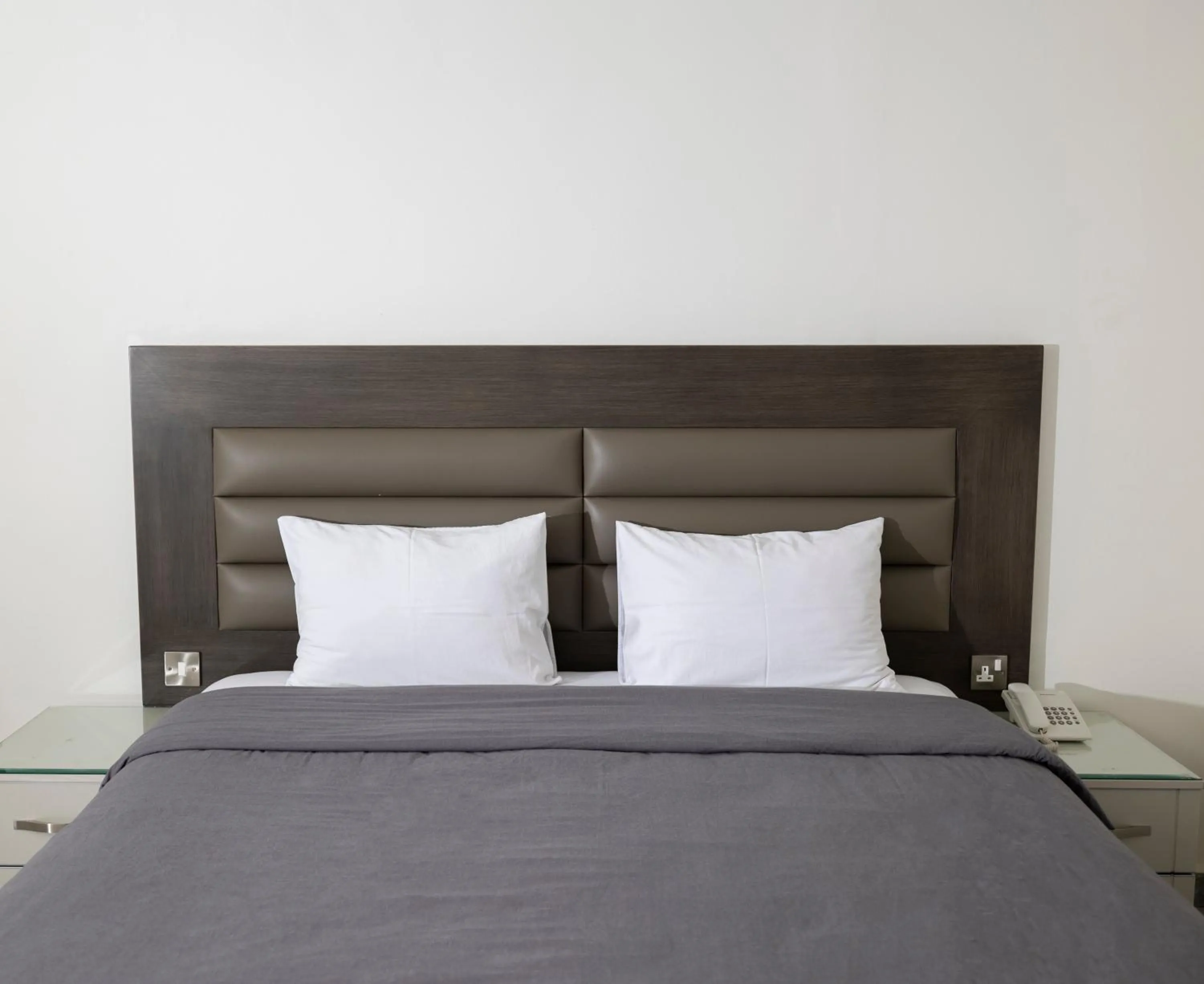 Bed in Salmiya Grand Hotel