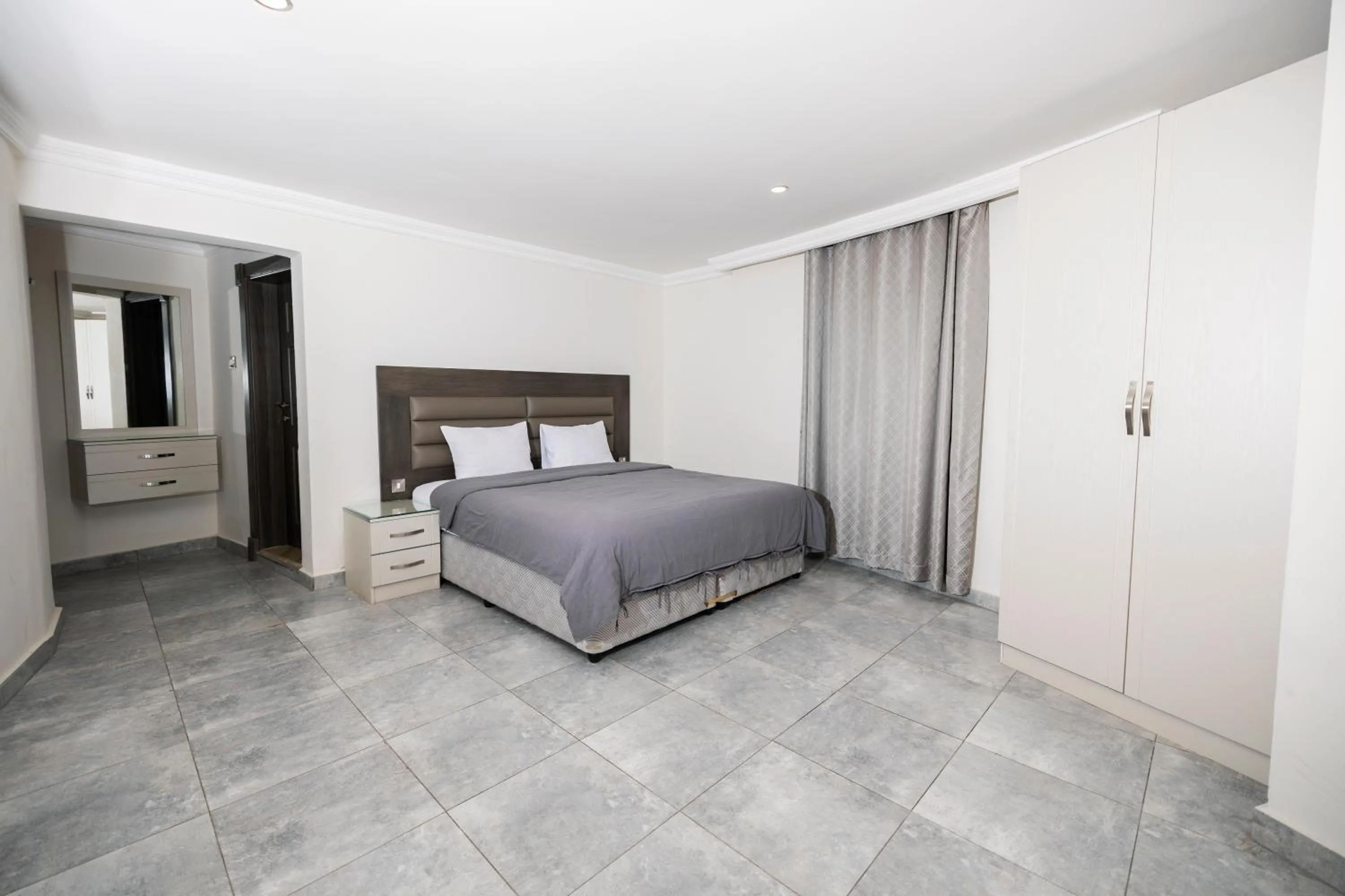 Bed in Salmiya Grand Hotel