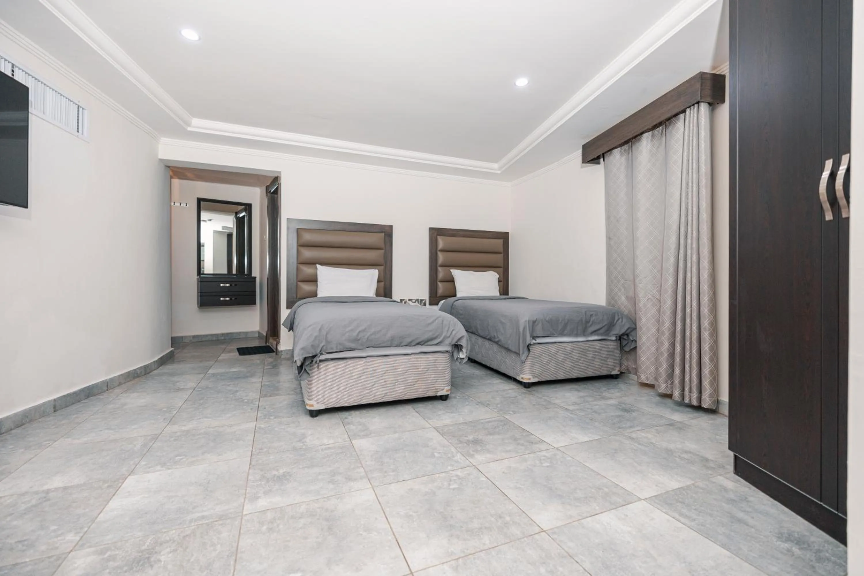 Bed in Salmiya Grand Hotel