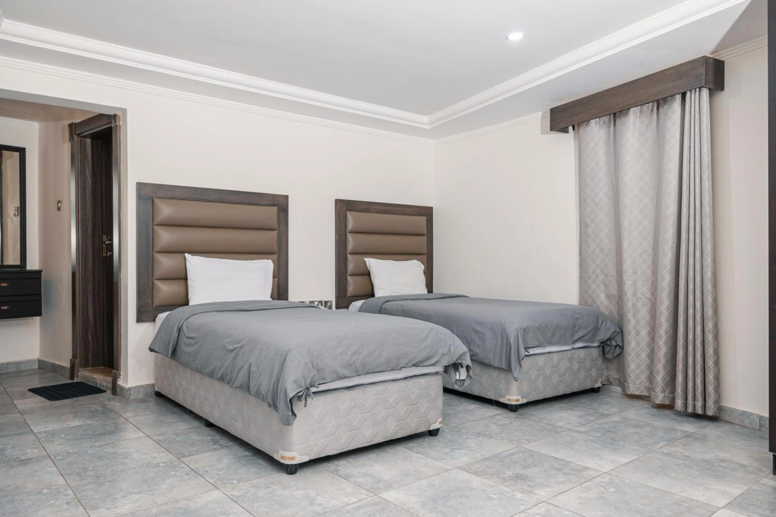 Bed in Salmiya Grand Hotel