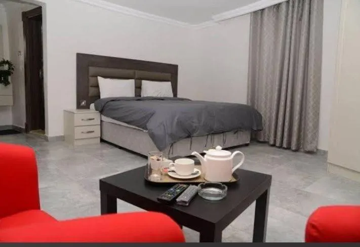 Bed in Salmiya Grand Hotel