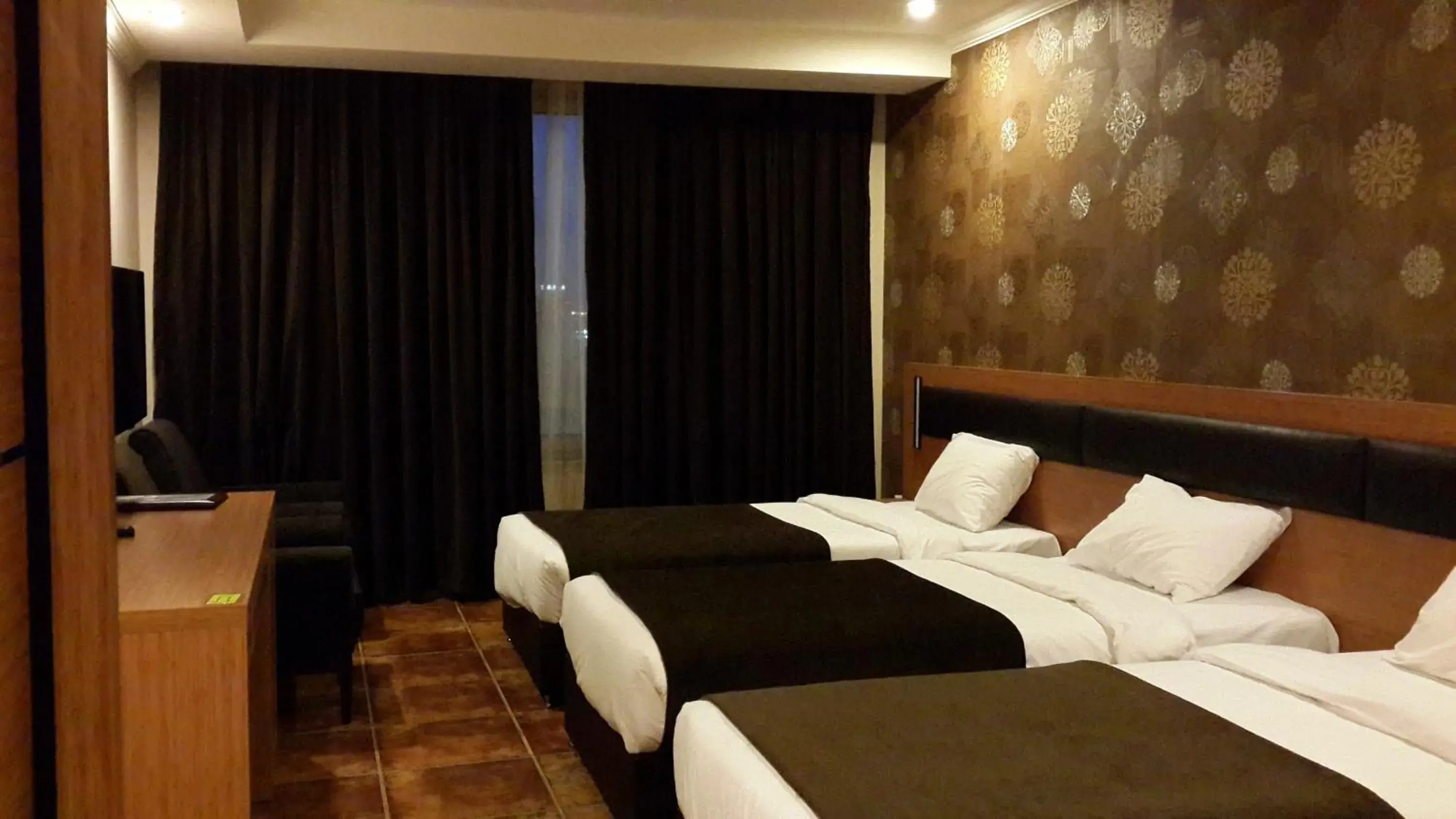 Standard Triple Room in Merci Hotel Erbil Standard Triple Room in Merci Hotel Erbil