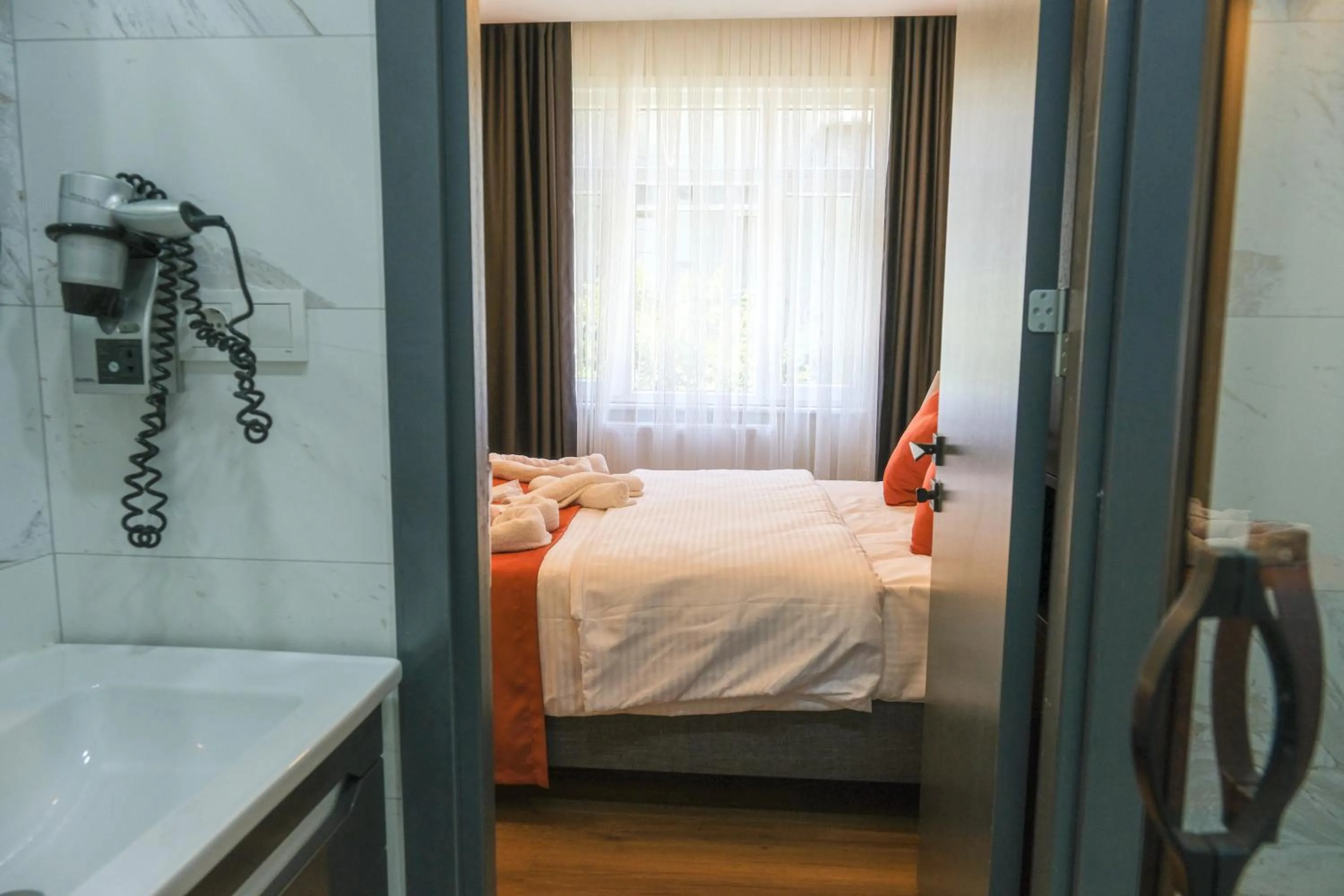 Bed in hotel La Vitrine