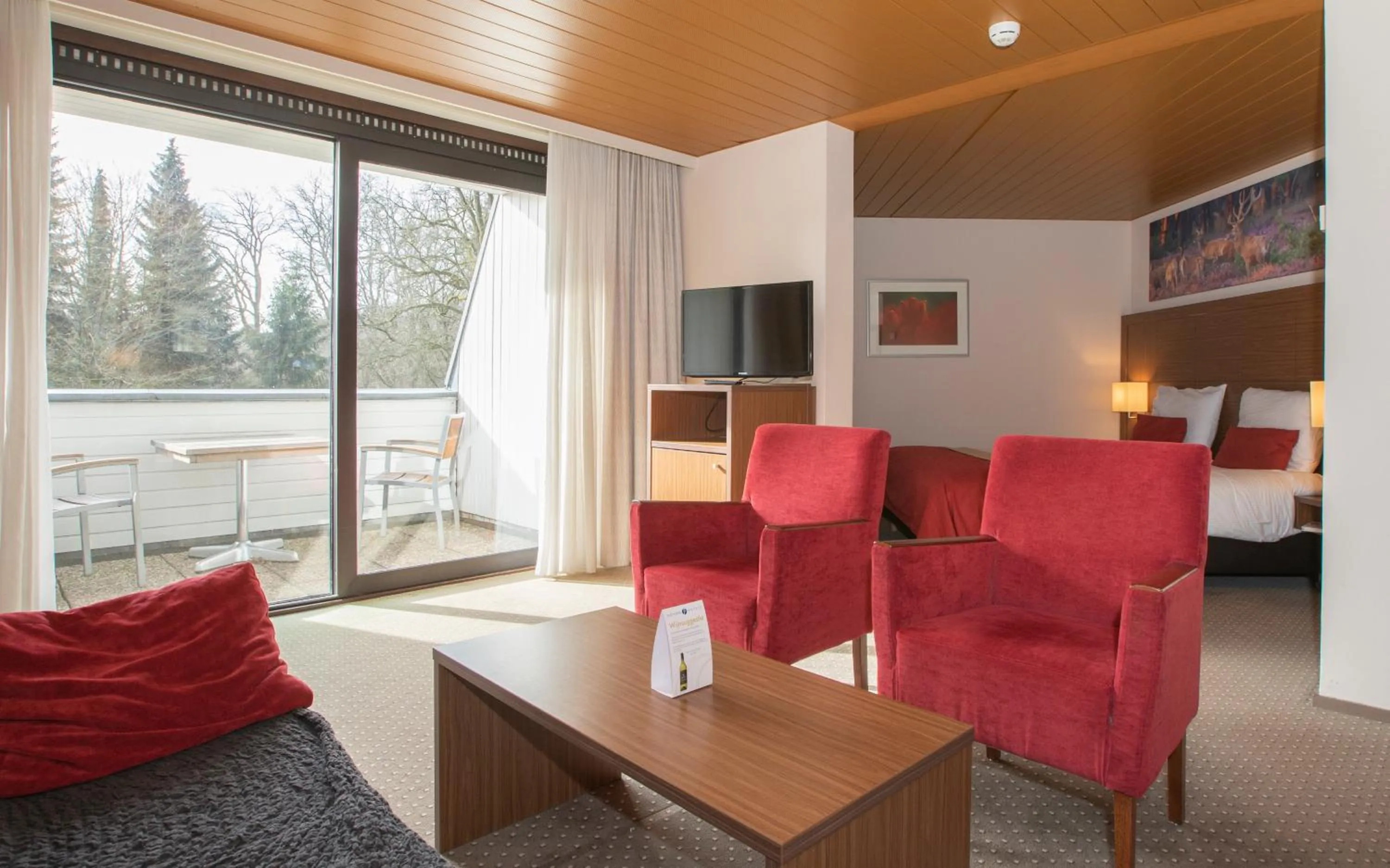 Seating area in Fletcher Hotel-Restaurant Wolfheze