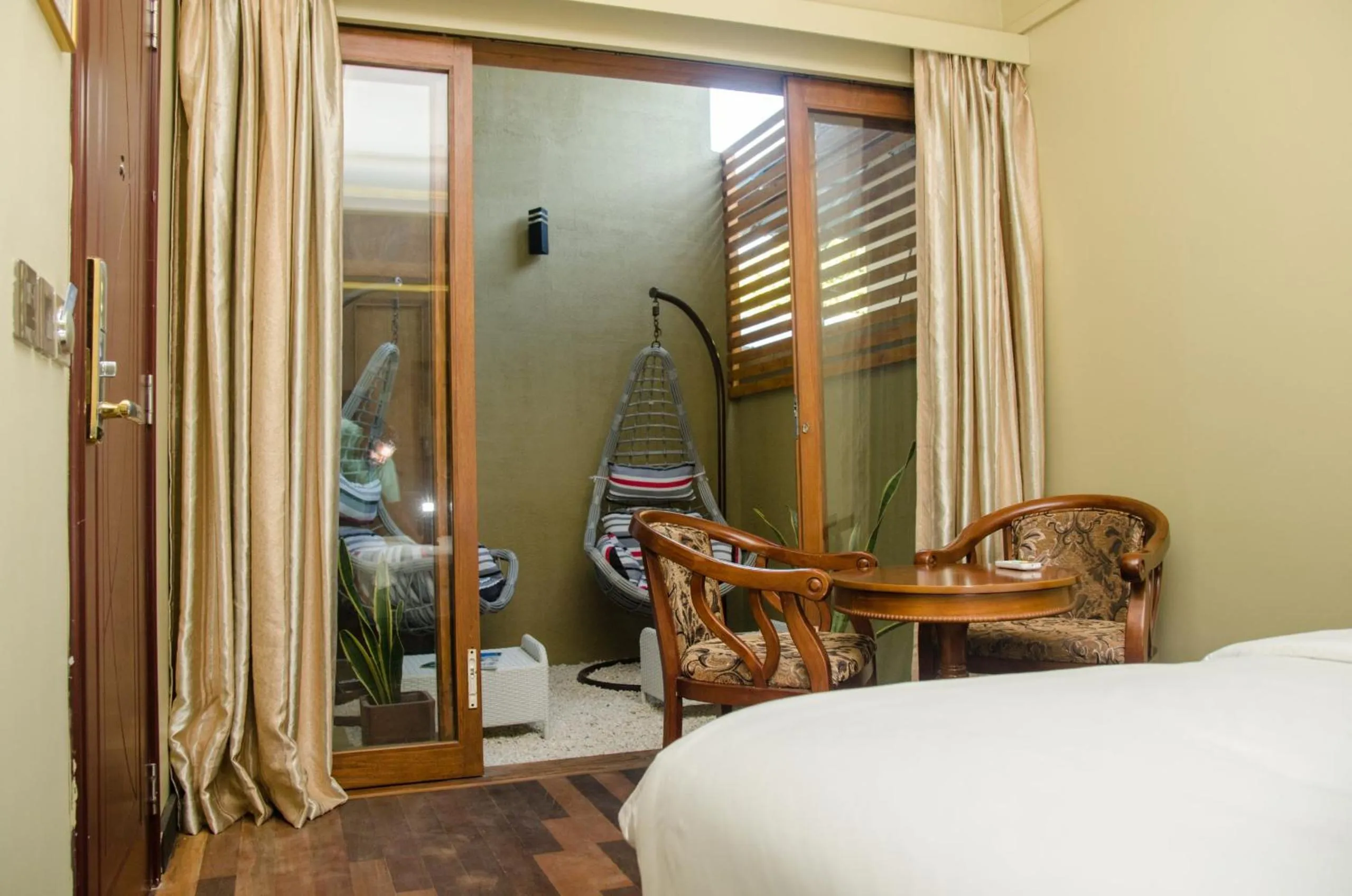 Seating area, Bed in Fuvahmulah Central Hotel