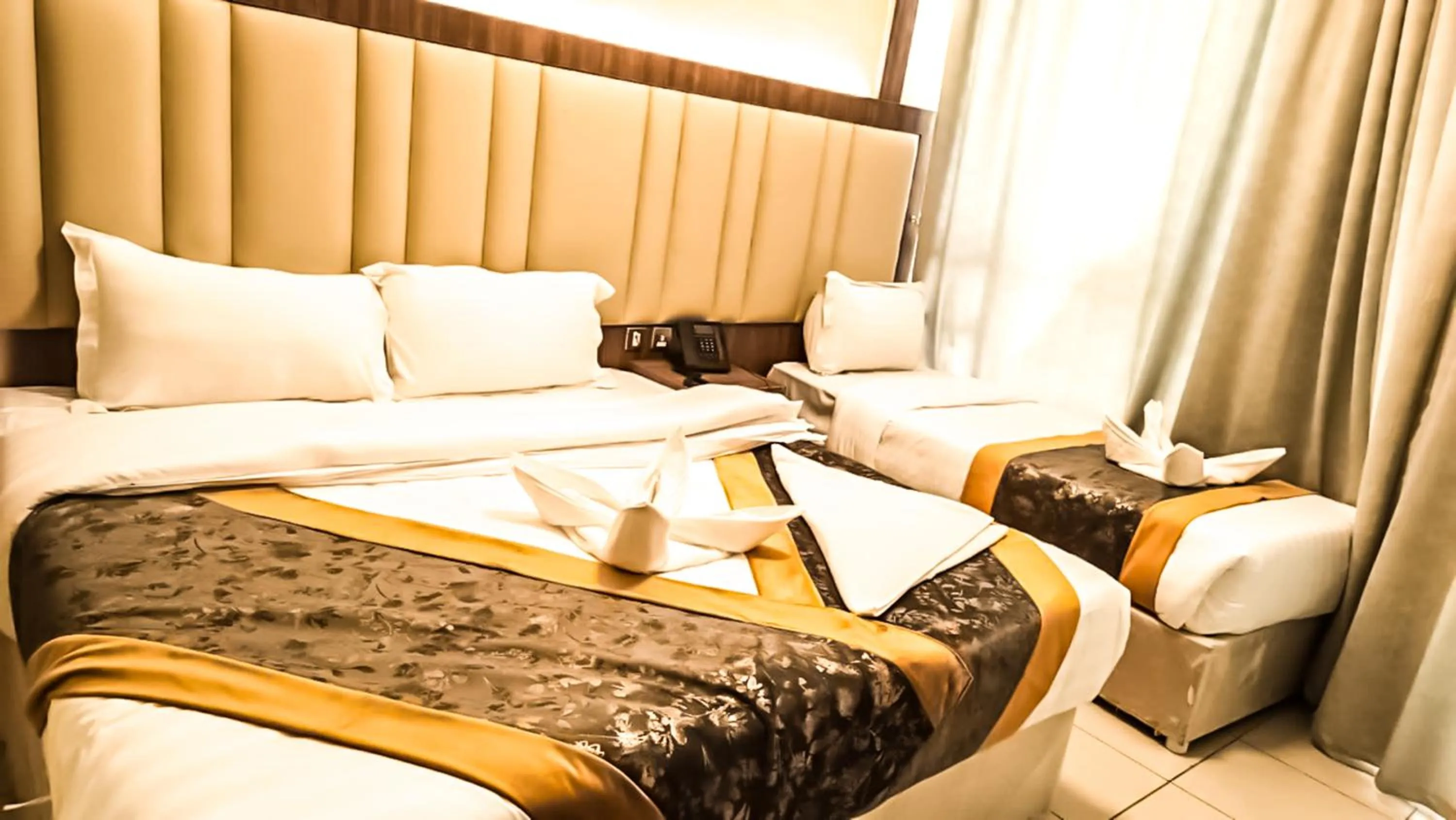 Bed in Diyafa Al Mukhtara Hotel فندق شركة ضيافة المختارة للخدمات الفندقية