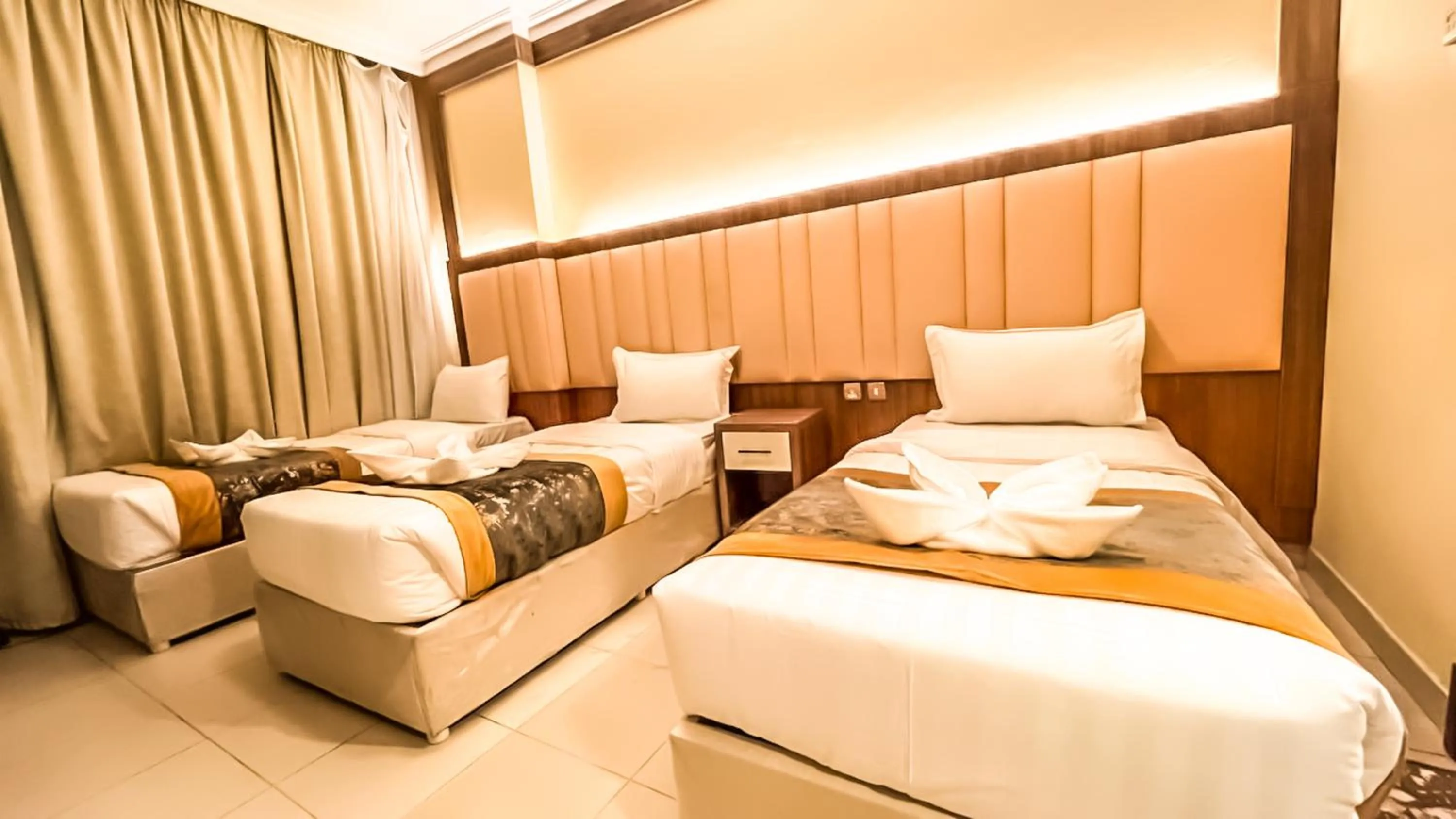 Bed in Diyafa Al Mukhtara Hotel فندق شركة ضيافة المختارة للخدمات الفندقية