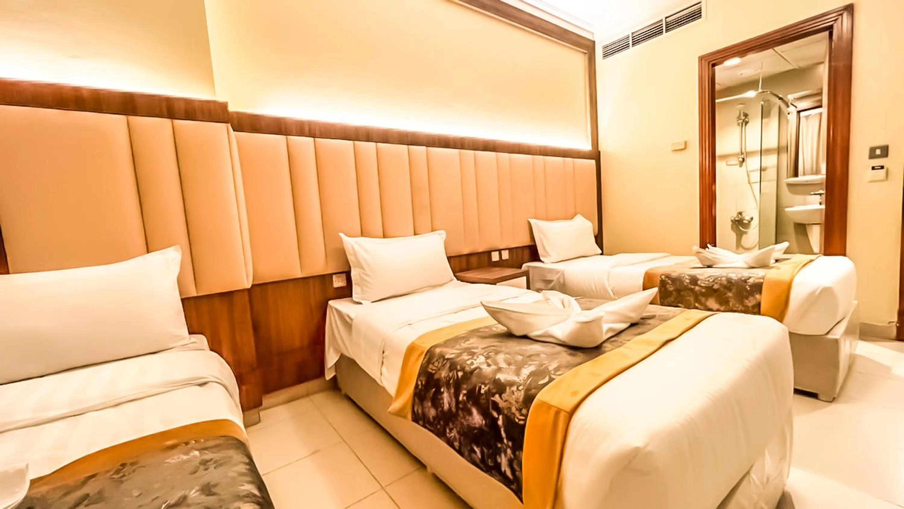 Bed in Diyafa Al Mukhtara Hotel فندق شركة ضيافة المختارة للخدمات الفندقية