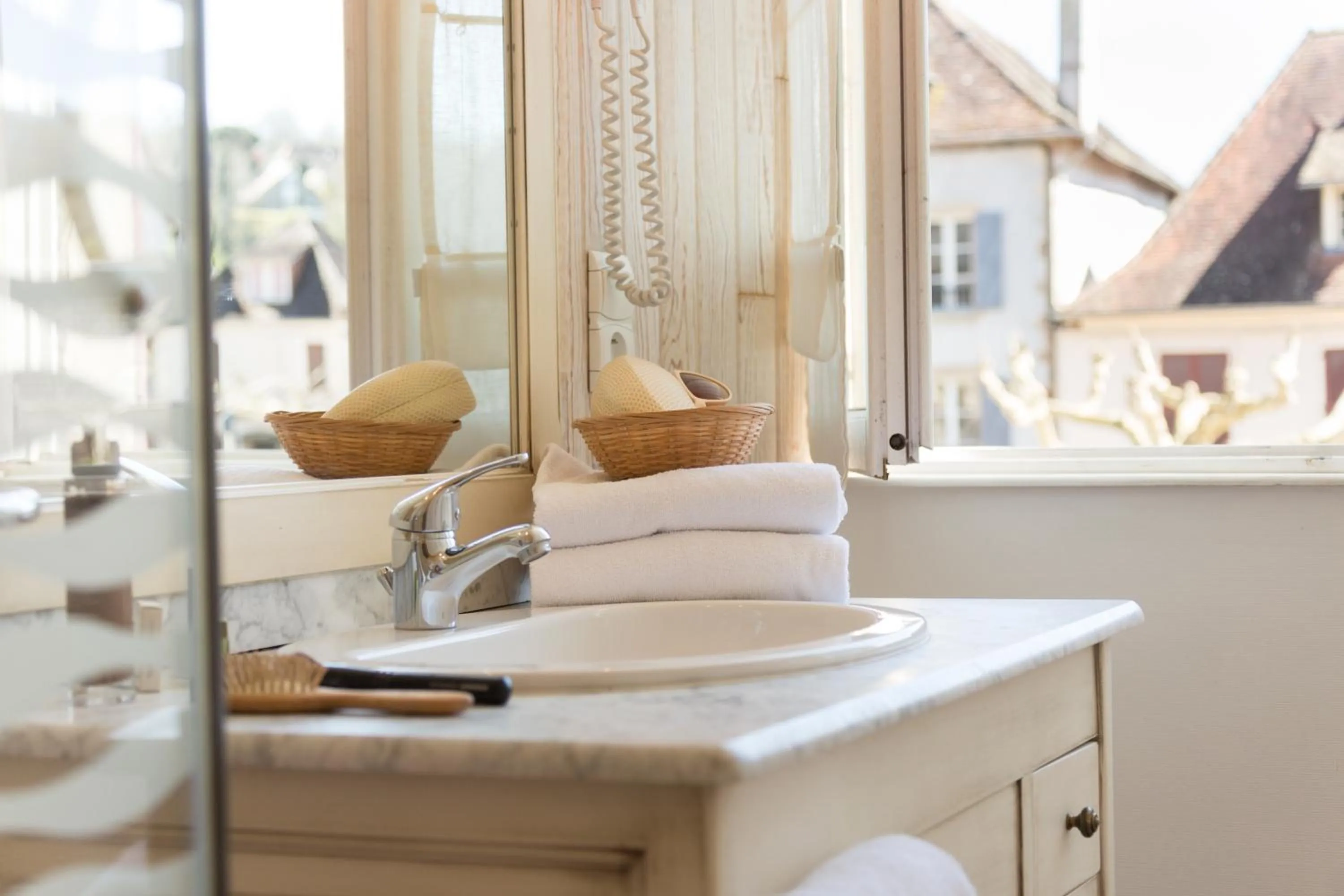 Bathroom in Logis Hôtel Le Beaulieu