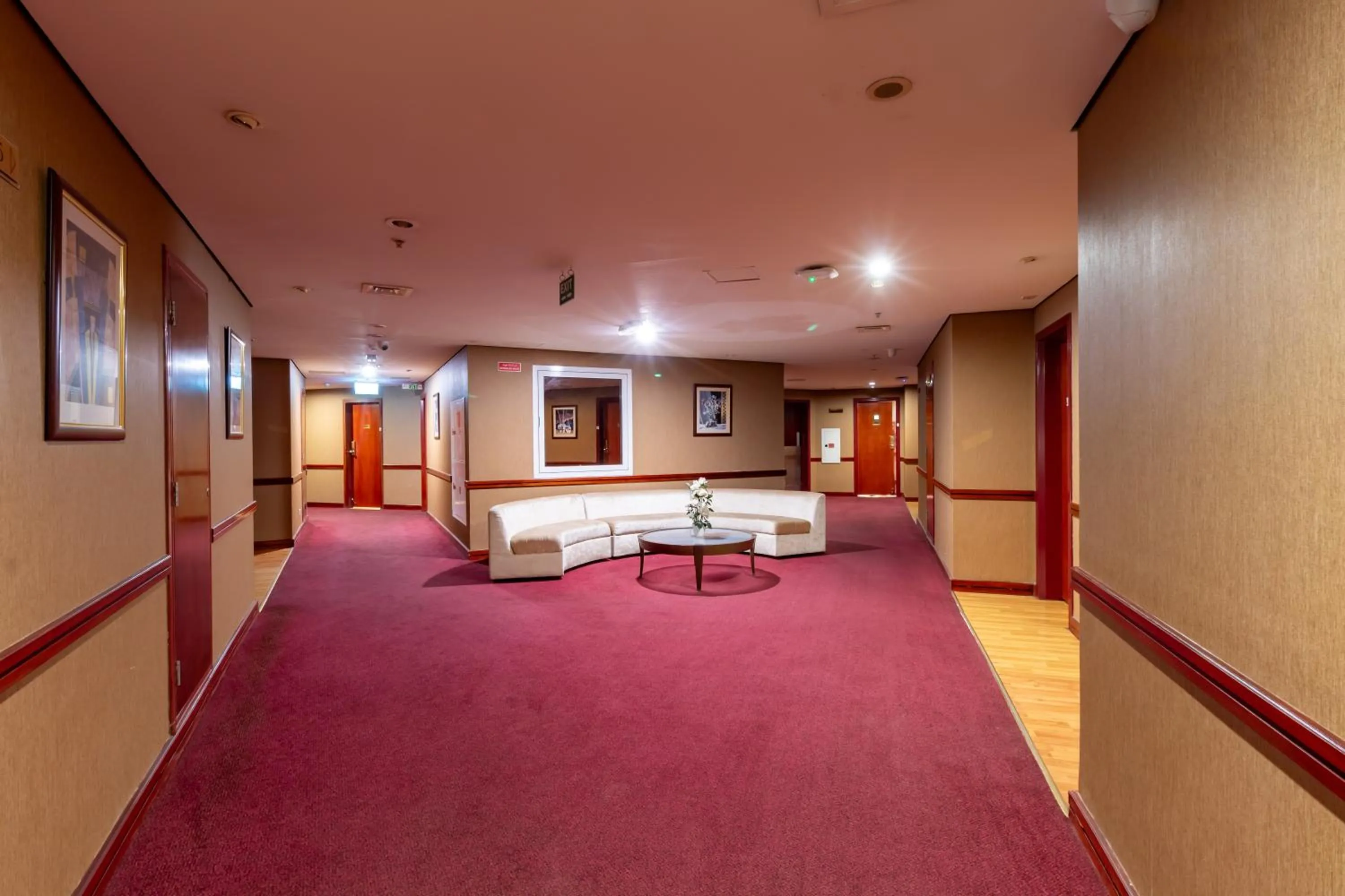 Seating area, Bed in City Palace Hotel
