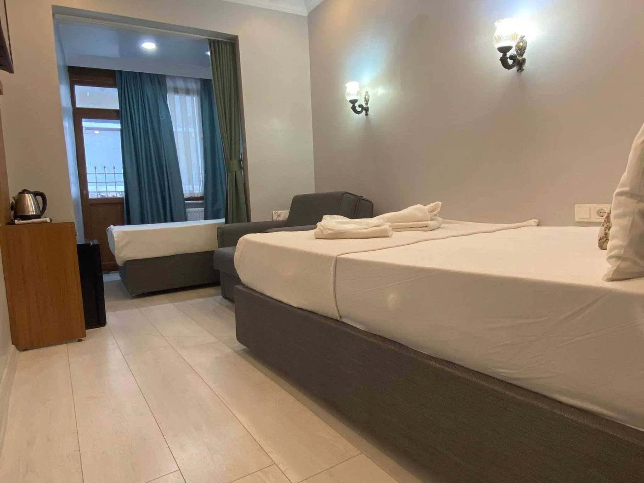 Bed in Riverland Suites Apart Hotel