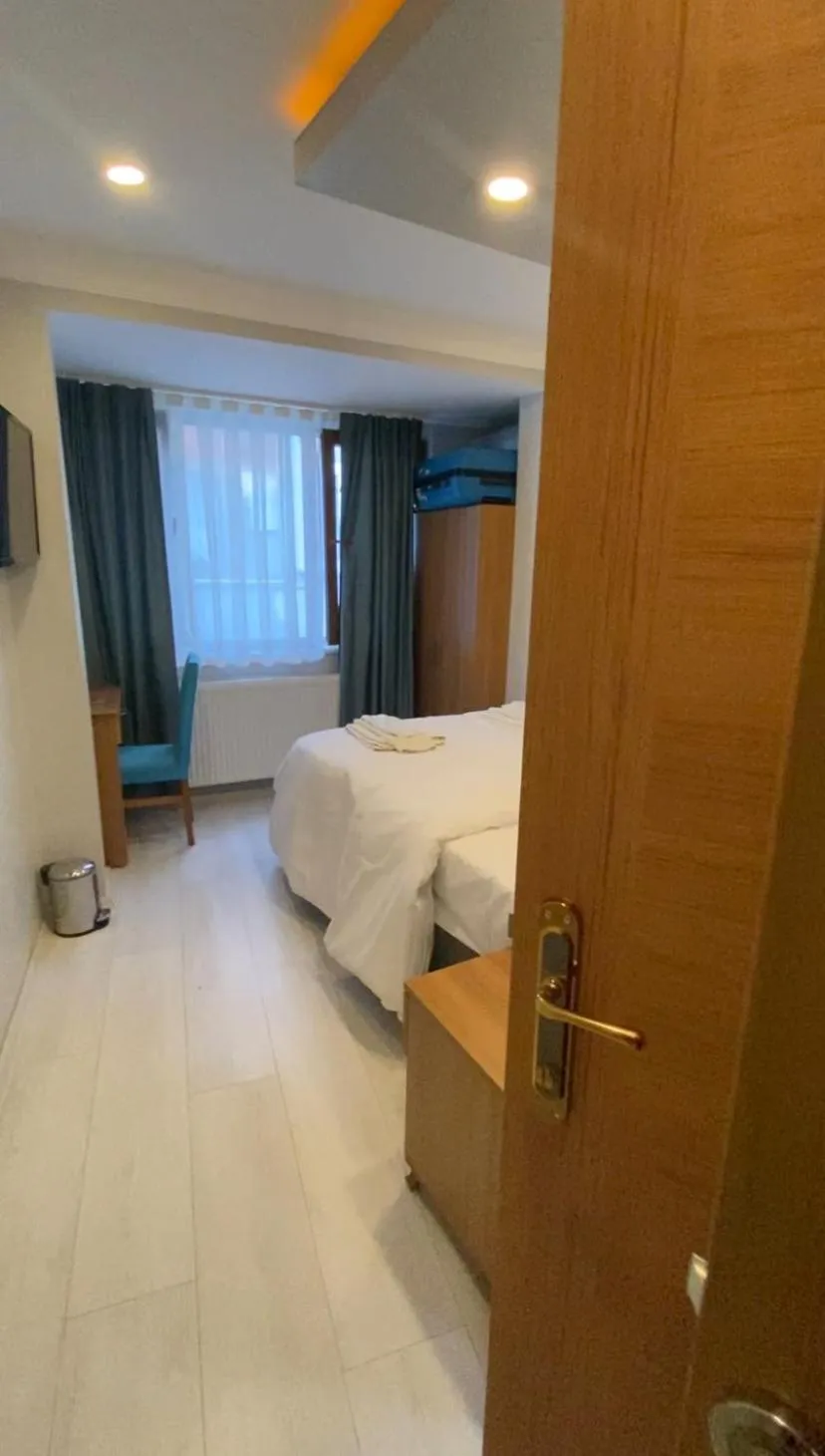 Bed in Riverland Suites Apart Hotel