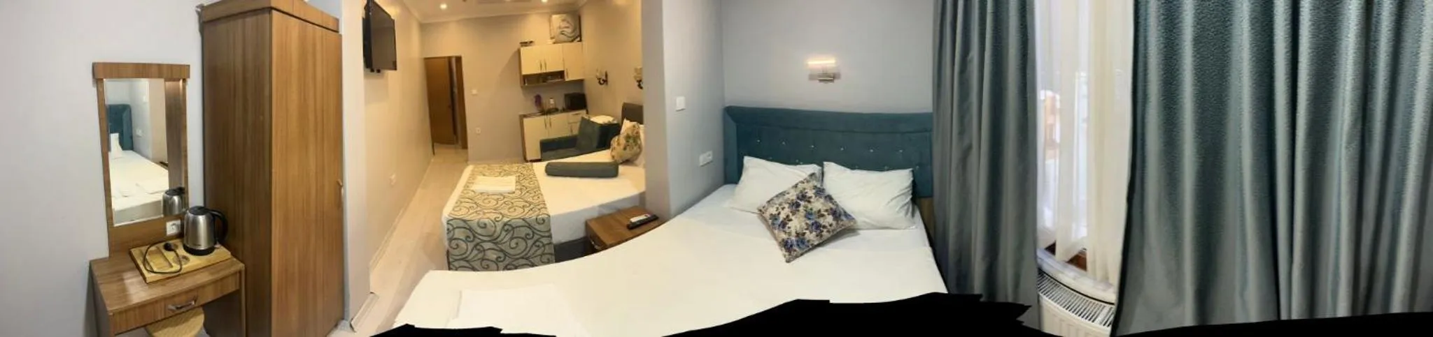 Bed in Riverland Suites Apart Hotel
