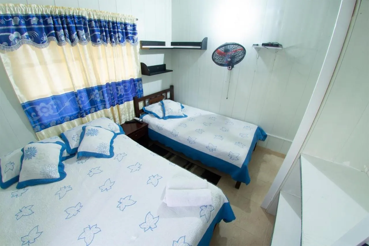 Bed in Posada Nativa Atardecer Isleño