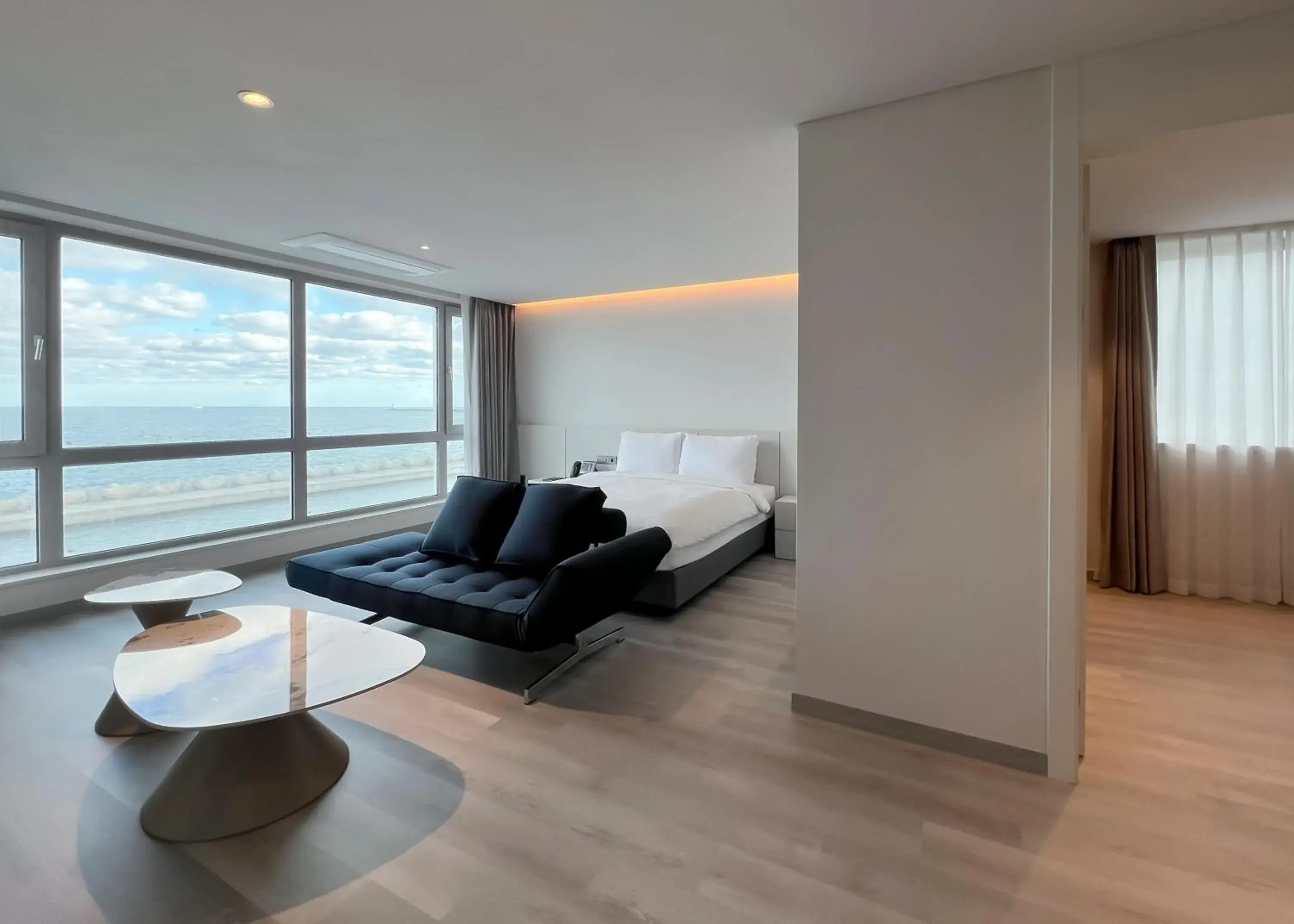 Photo of the whole room in Ocean Suites Jeju Hotel Photo of the whole room in Ocean Suites Jeju Hotel