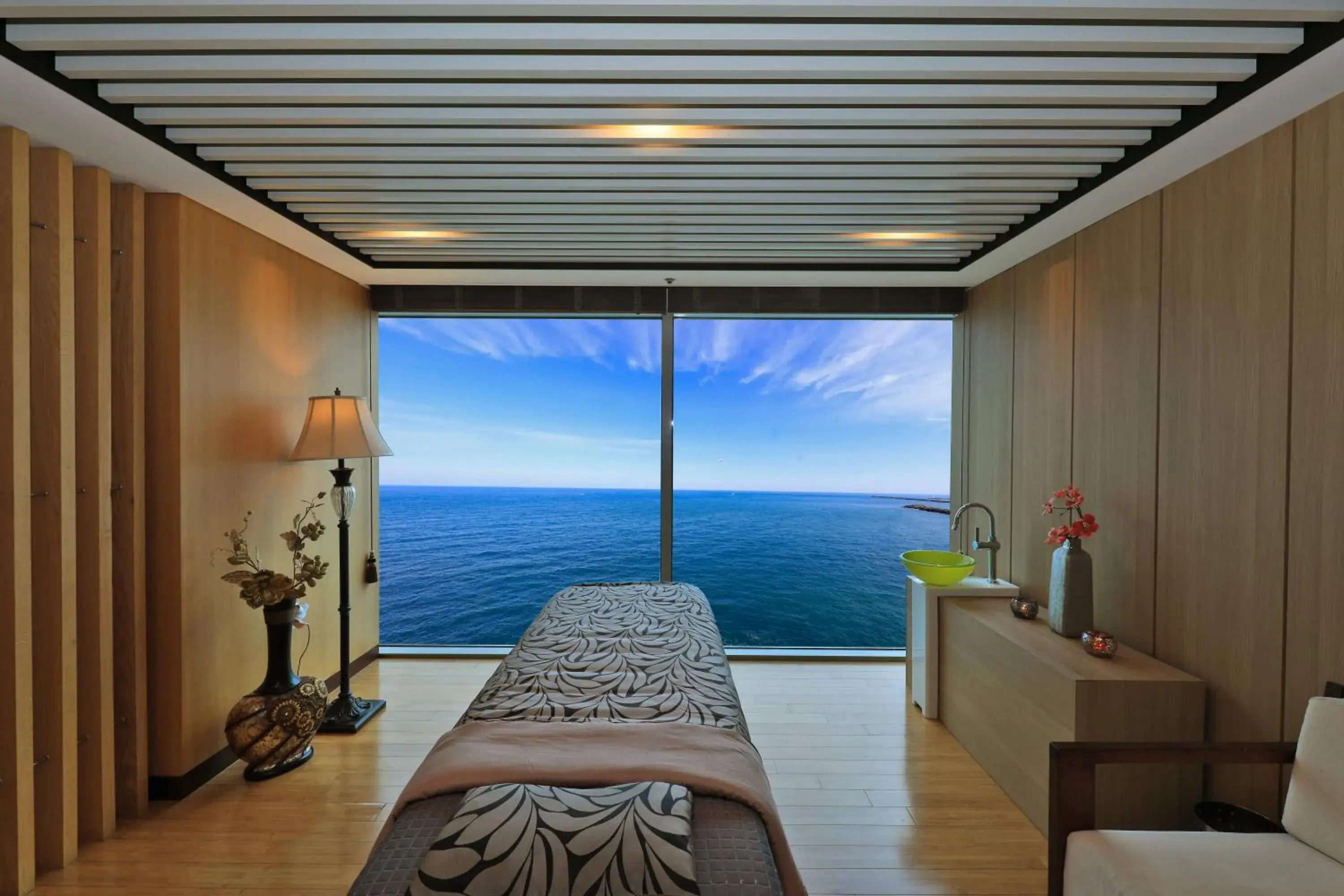 Massage, Bed in Ocean Suites Jeju Hotel Massage, Bed in Ocean Suites Jeju Hotel