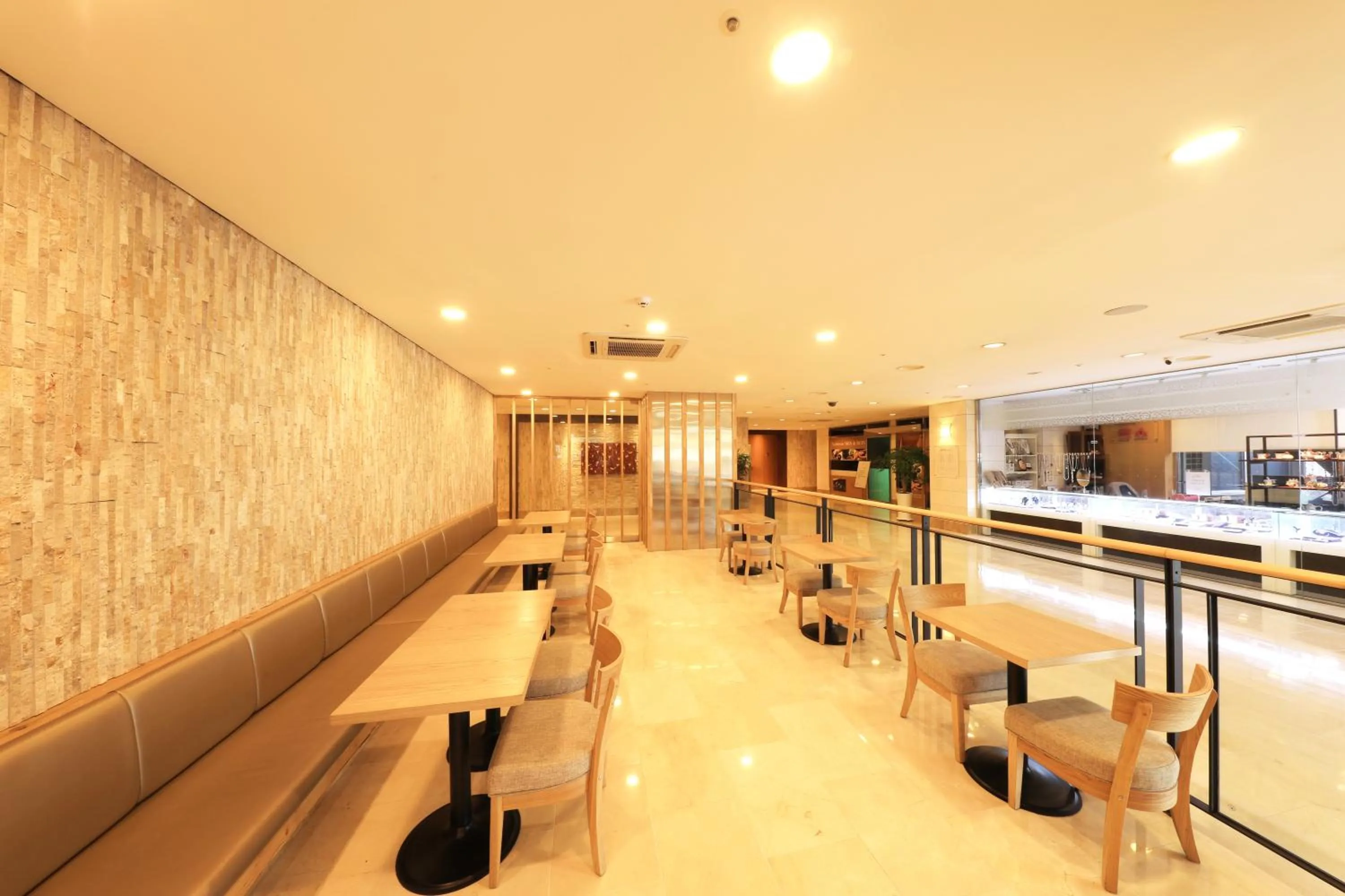 Lobby or reception in Ocean Suites Jeju Hotel