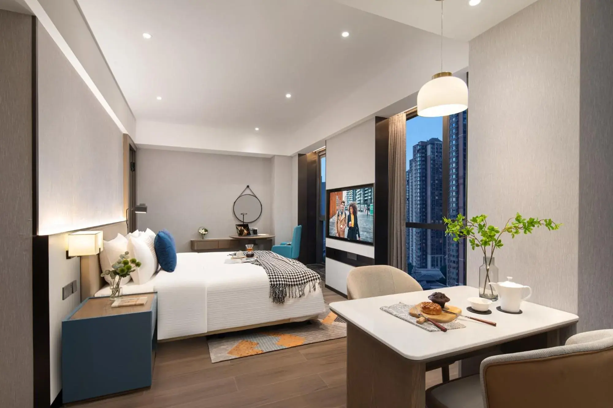 TV and multimedia, Bed in Citadines Jinqiao Building Yantai TV and multimedia, Bed in Citadines Jinqiao Building Yantai