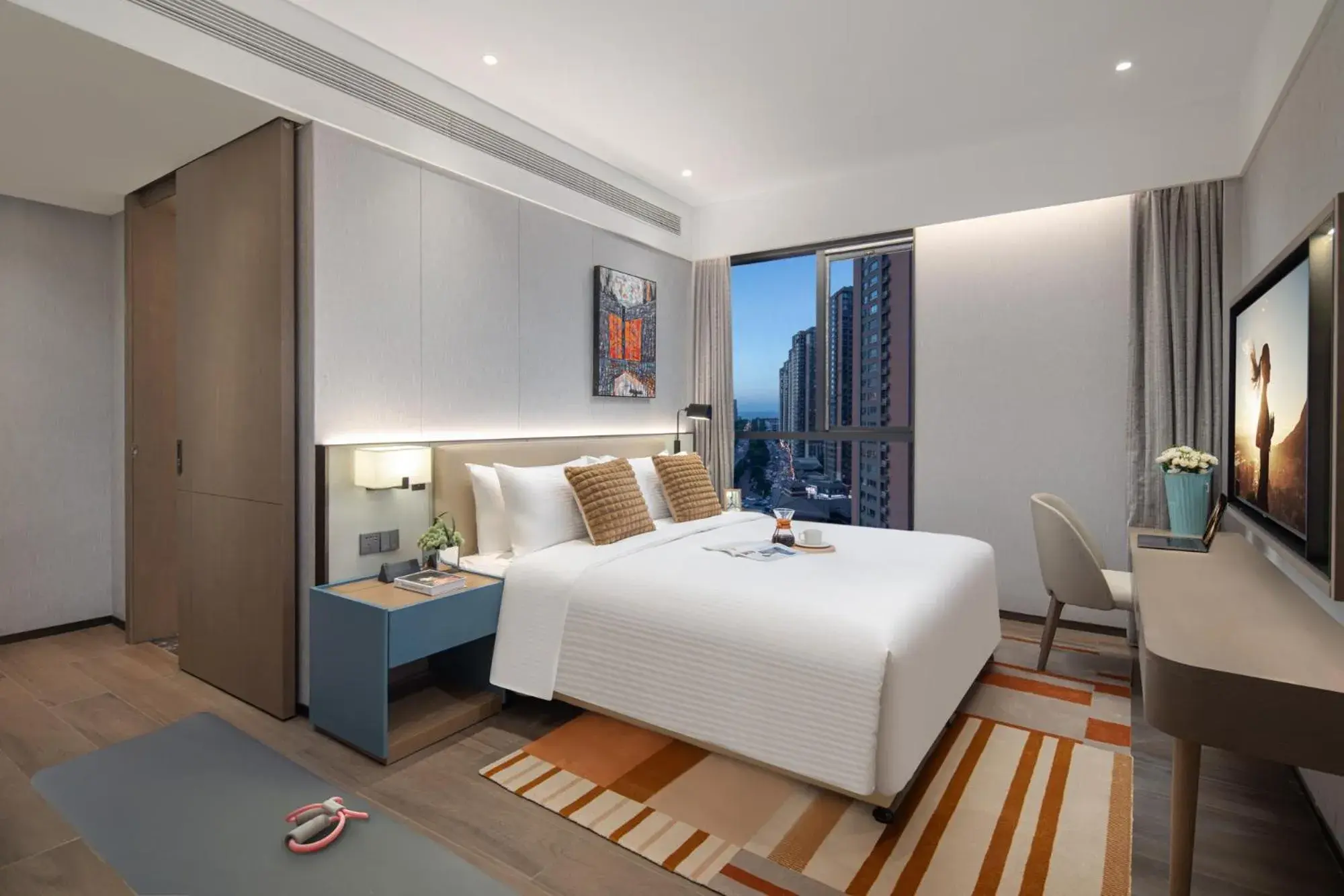 TV and multimedia, Bed in Citadines Jinqiao Building Yantai TV and multimedia, Bed in Citadines Jinqiao Building Yantai