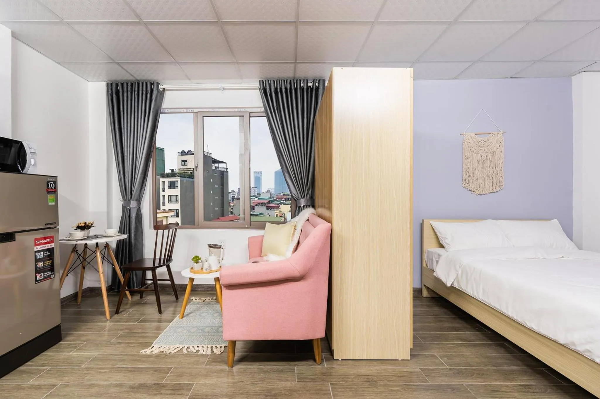 Photo of the whole room in SaziHome Doi Can Hanoi