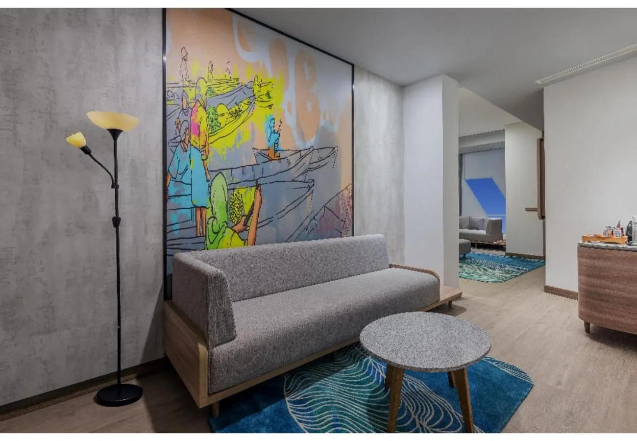 Living room in Harper Banjarmasin by ASTON