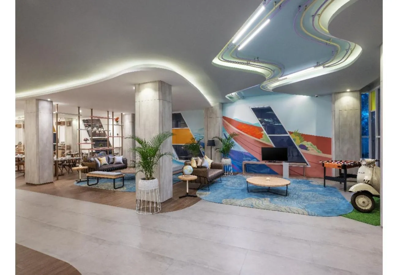 Lobby or reception in Harper Banjarmasin by ASTON