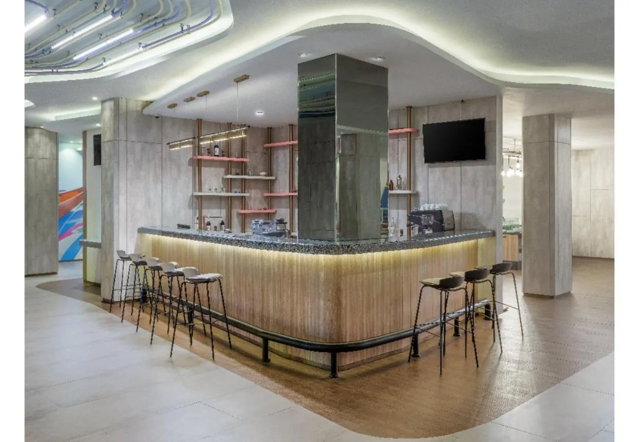 Lounge or bar in Harper Banjarmasin by ASTON