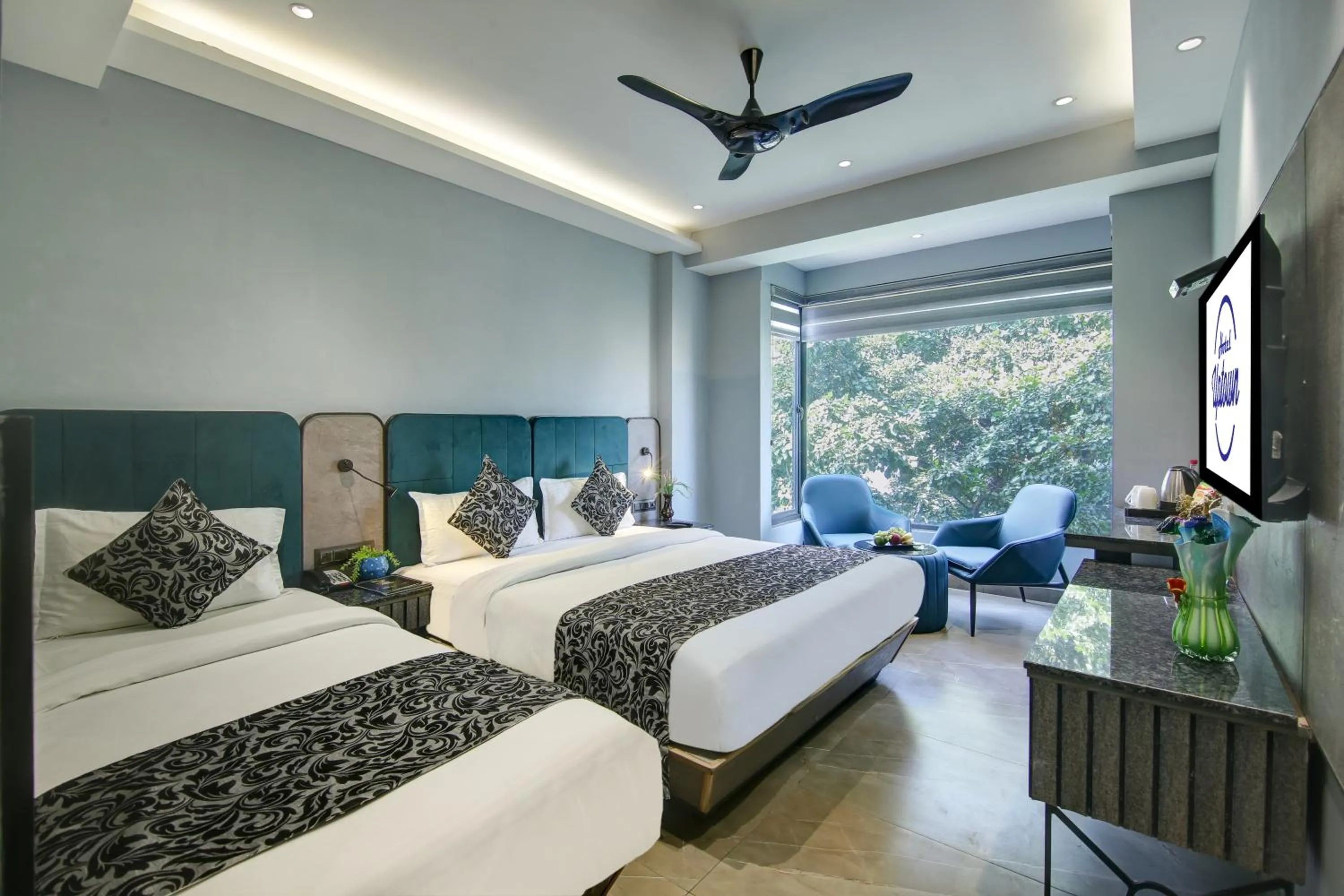 Luxury Family Studio + Window + City View + Free Early Check-In (Subject to Availability) in HOTEL UPTOWN with Luxury Restaurant & Rooftop Near Connaught Place, New Delhi City Centre