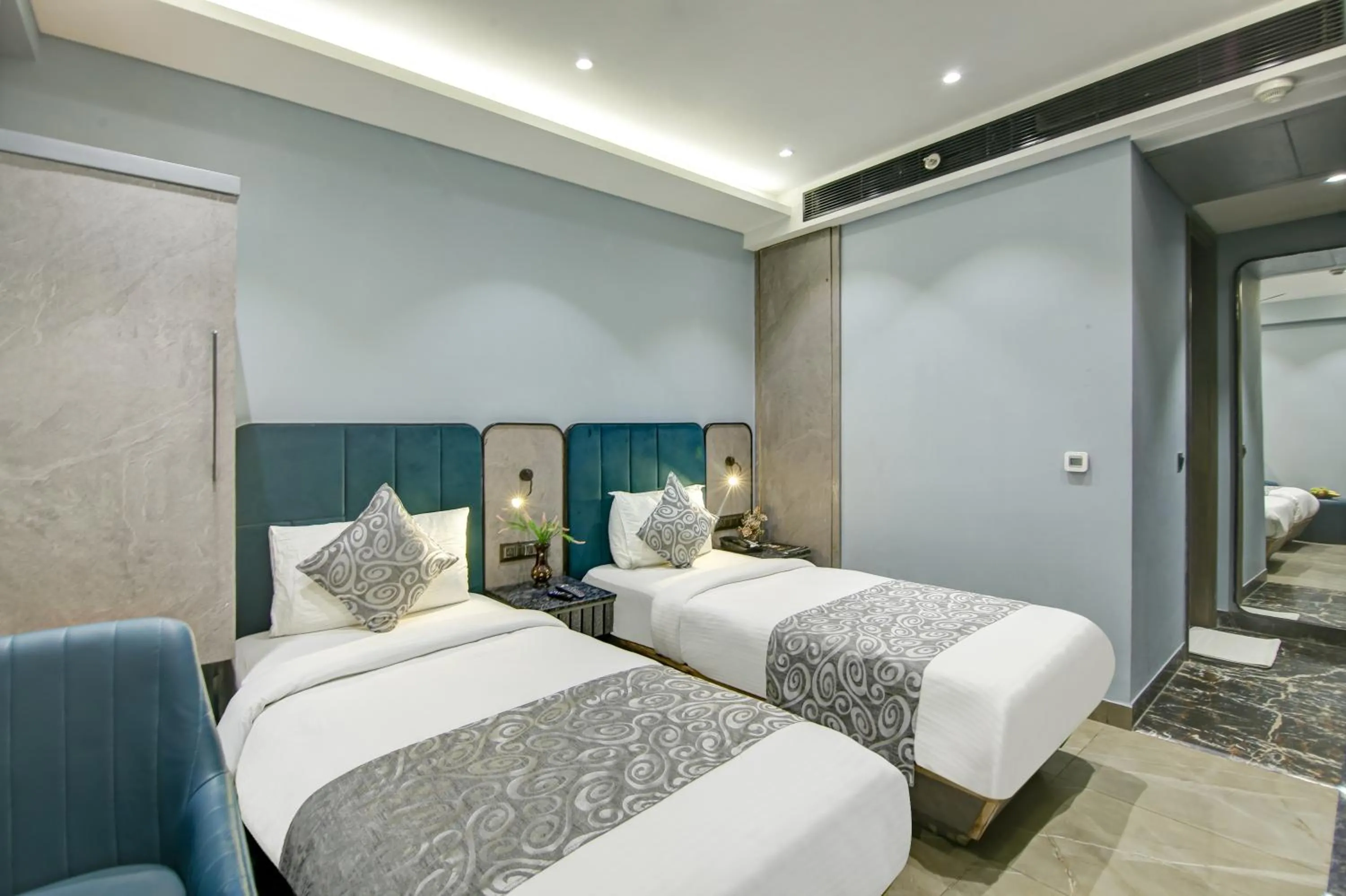 Executive Twin Room + 2 Single Beds + Free Early Check-In (Subject to Availability) in HOTEL UPTOWN with Luxury Restaurant & Rooftop Near Connaught Place, New Delhi City Centre