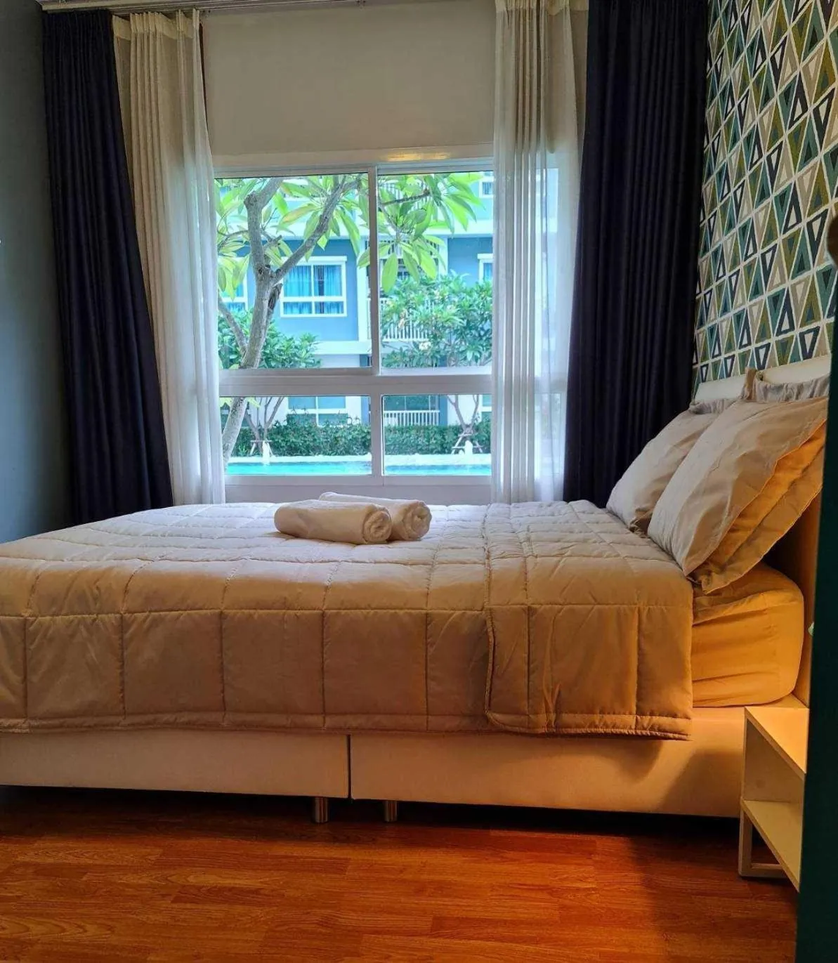 Photo of the whole room in The Trust Condo by the Sea