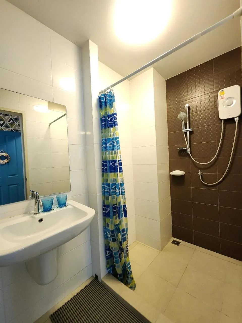 Shower in The Trust Condo by the Sea