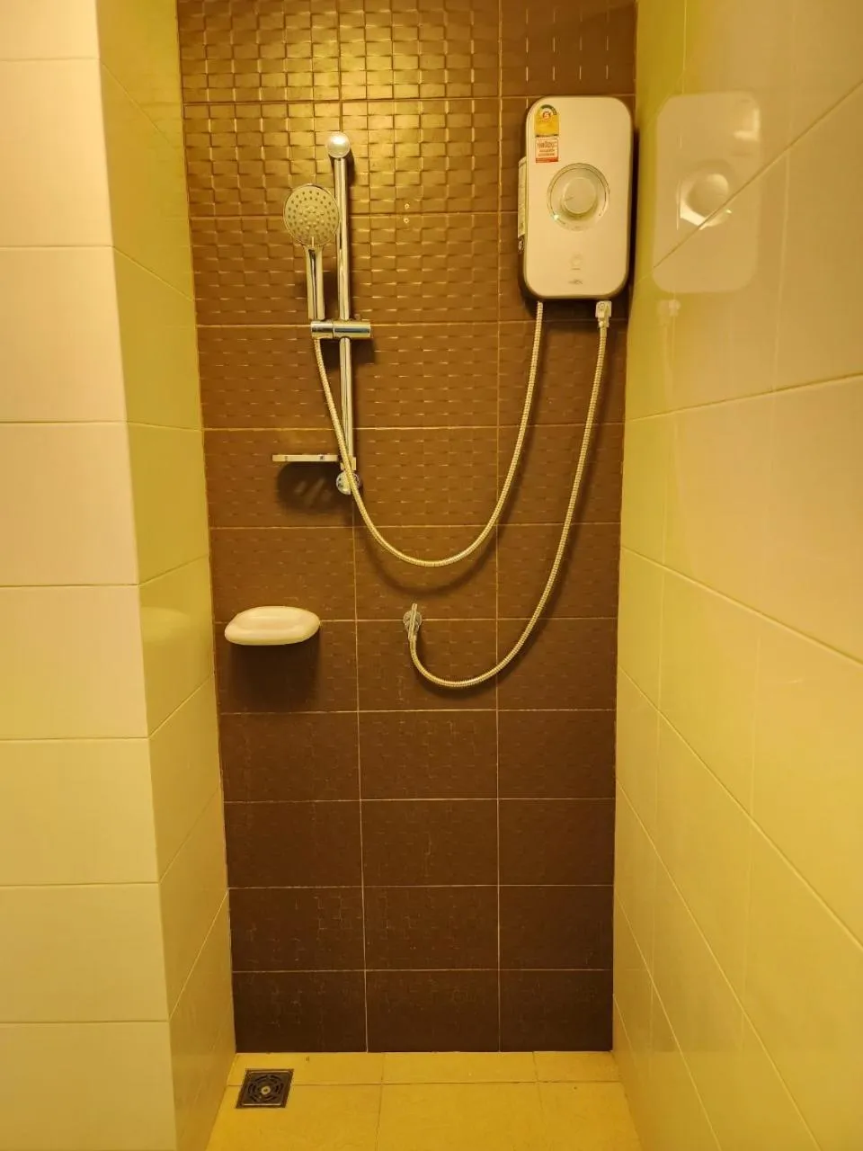 Shower in The Trust Condo by the Sea