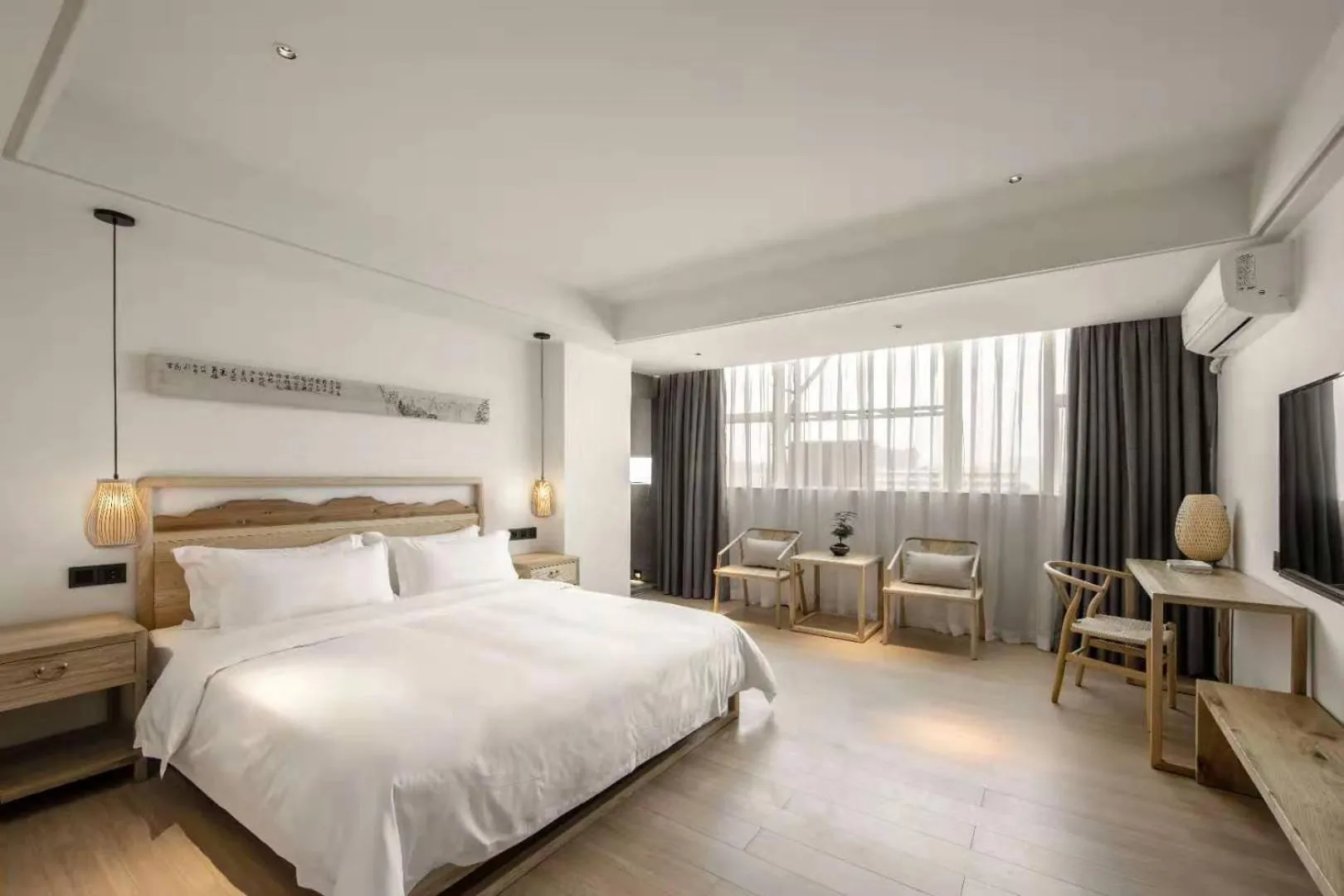 Bed in Guangzhou Shug Art Hotel