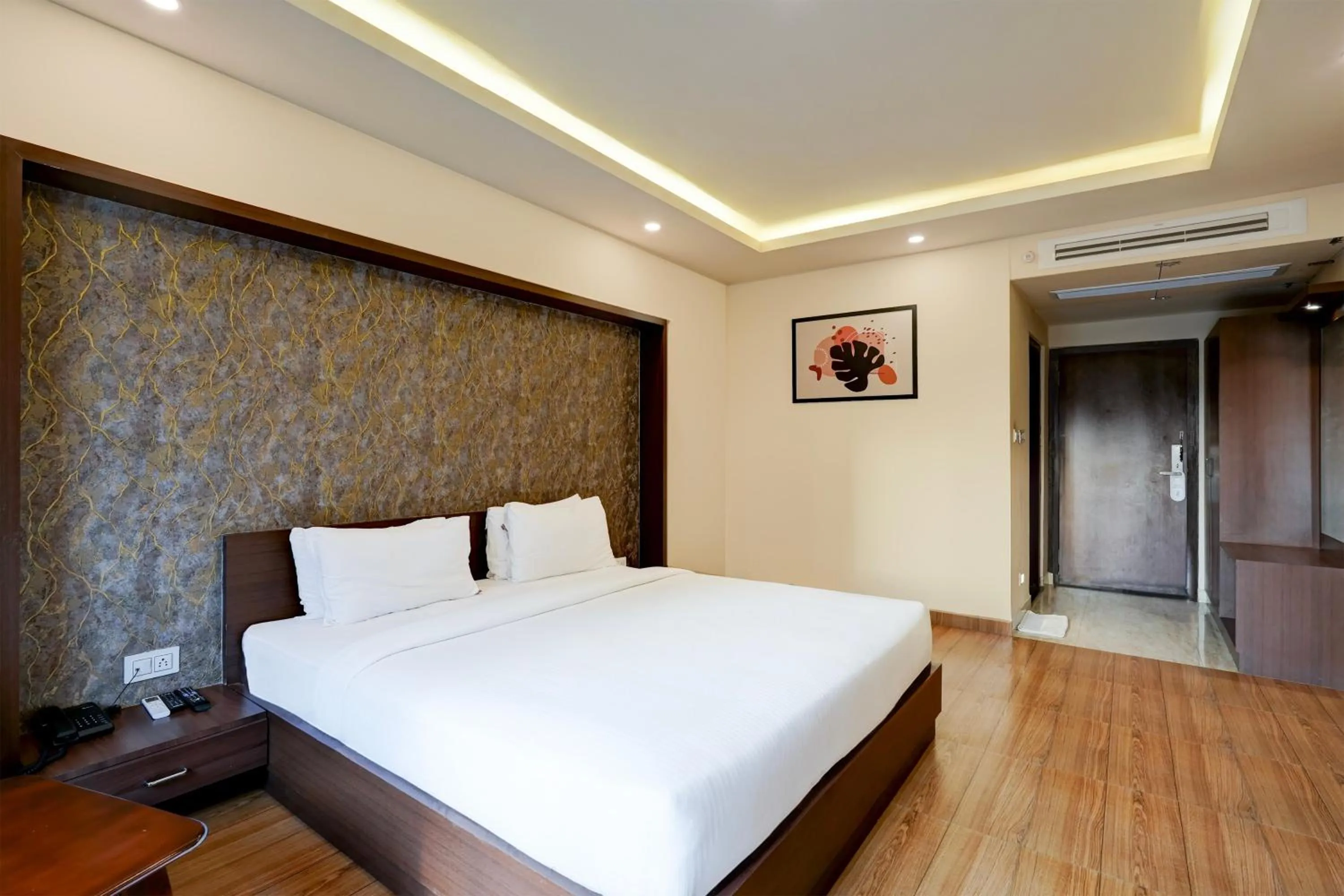 Bedroom, Bed in Super Townhouse Oak Mahadevapura Opposite Phoenix Mall Formerly Grand Wilton Inn