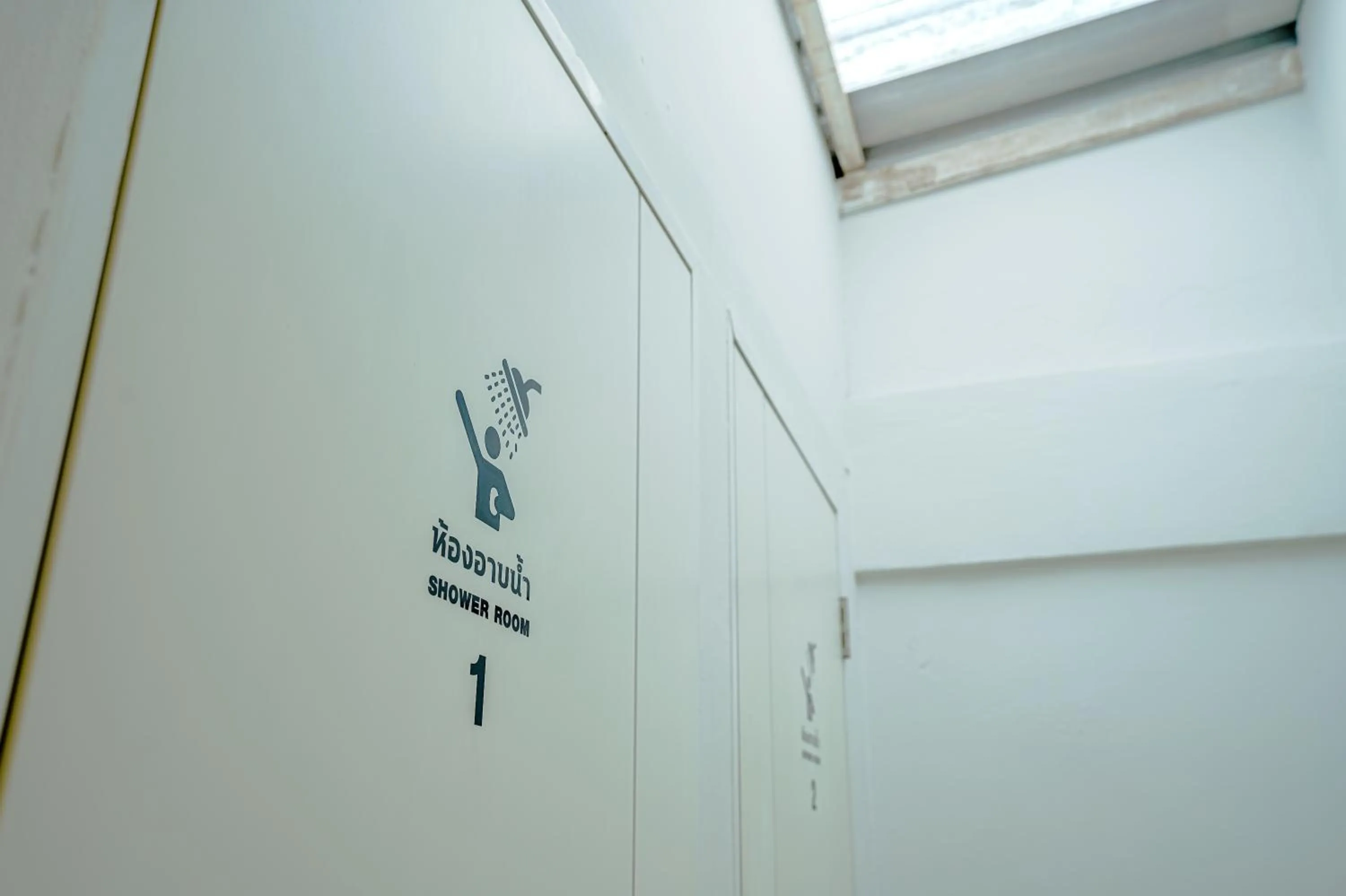 Bathroom in PICCOLO SUKHUMVIT HOSTEL- Self check-in after 6 pm