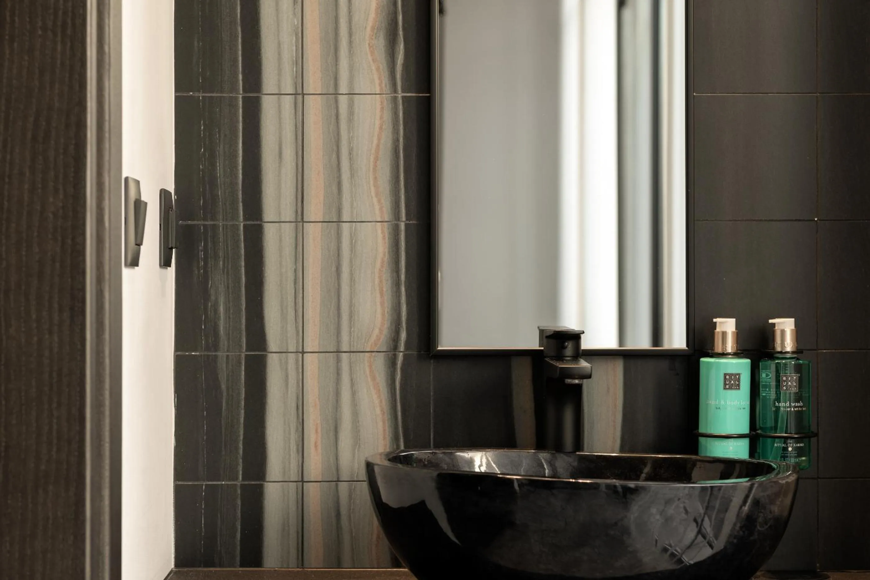 Bathroom in Pleiades Urban Stay by Semavί