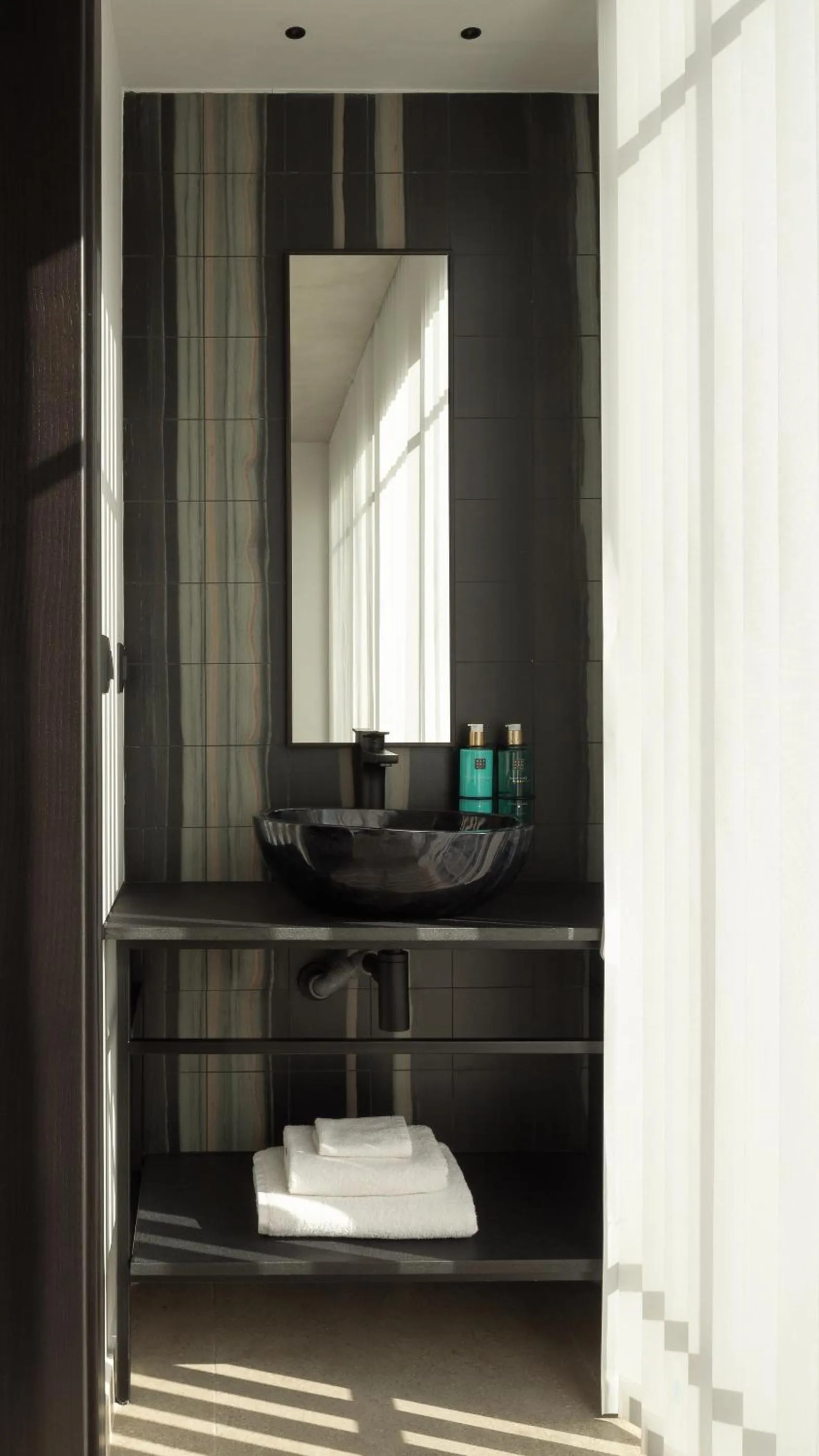 Bathroom in Pleiades Urban Stay by Semavί