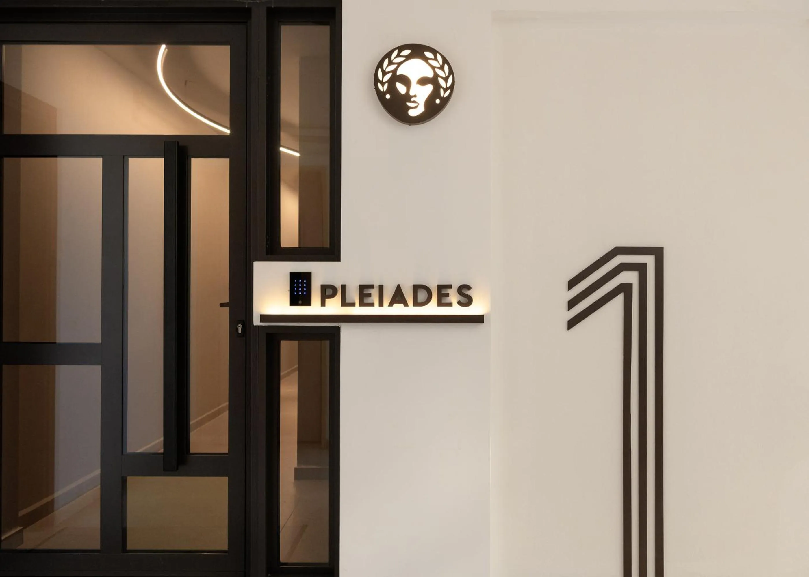 Property logo or sign in Pleiades Urban Stay by Semavί
