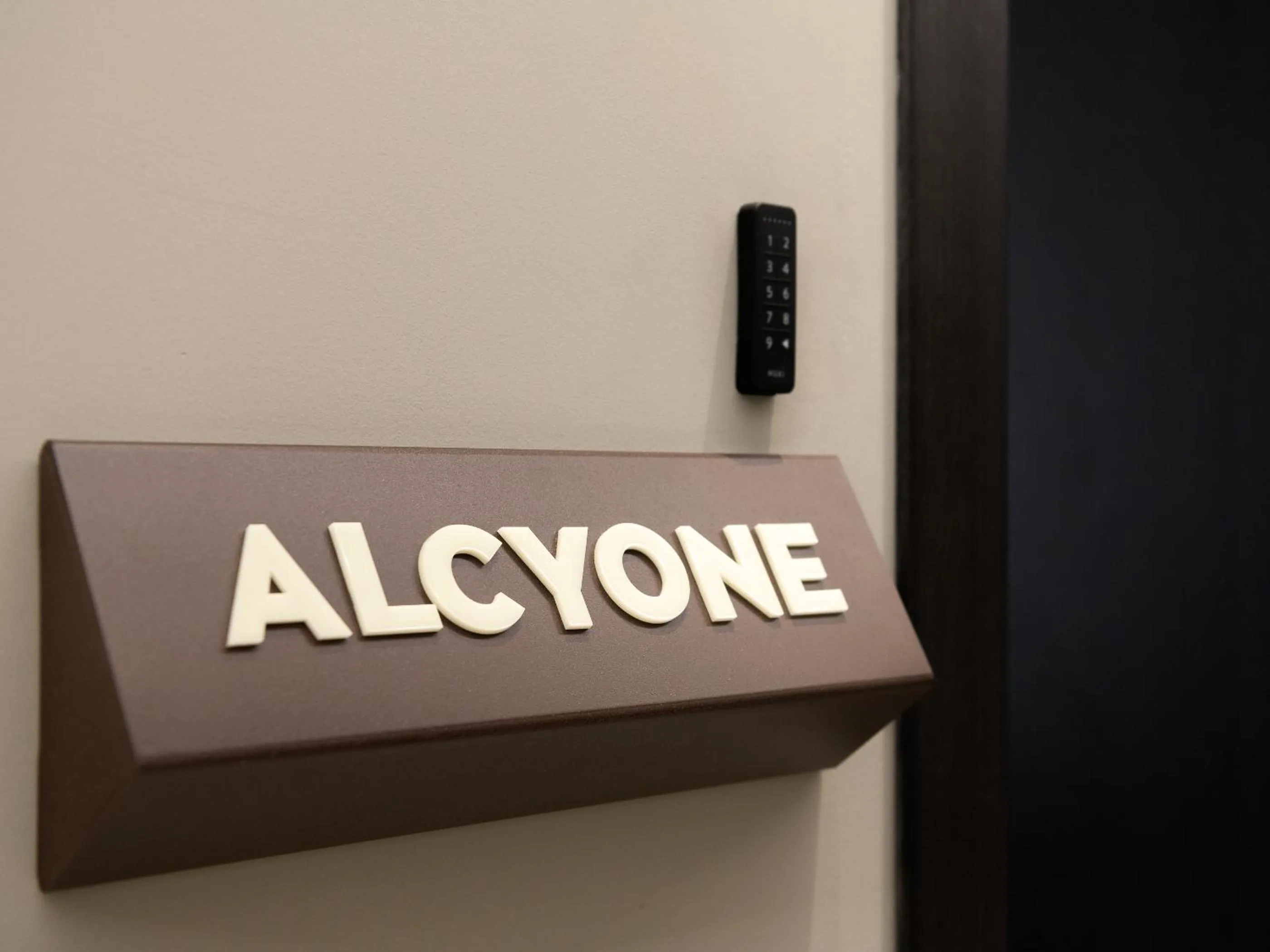 Property logo or sign in Pleiades Urban Stay by Semavί