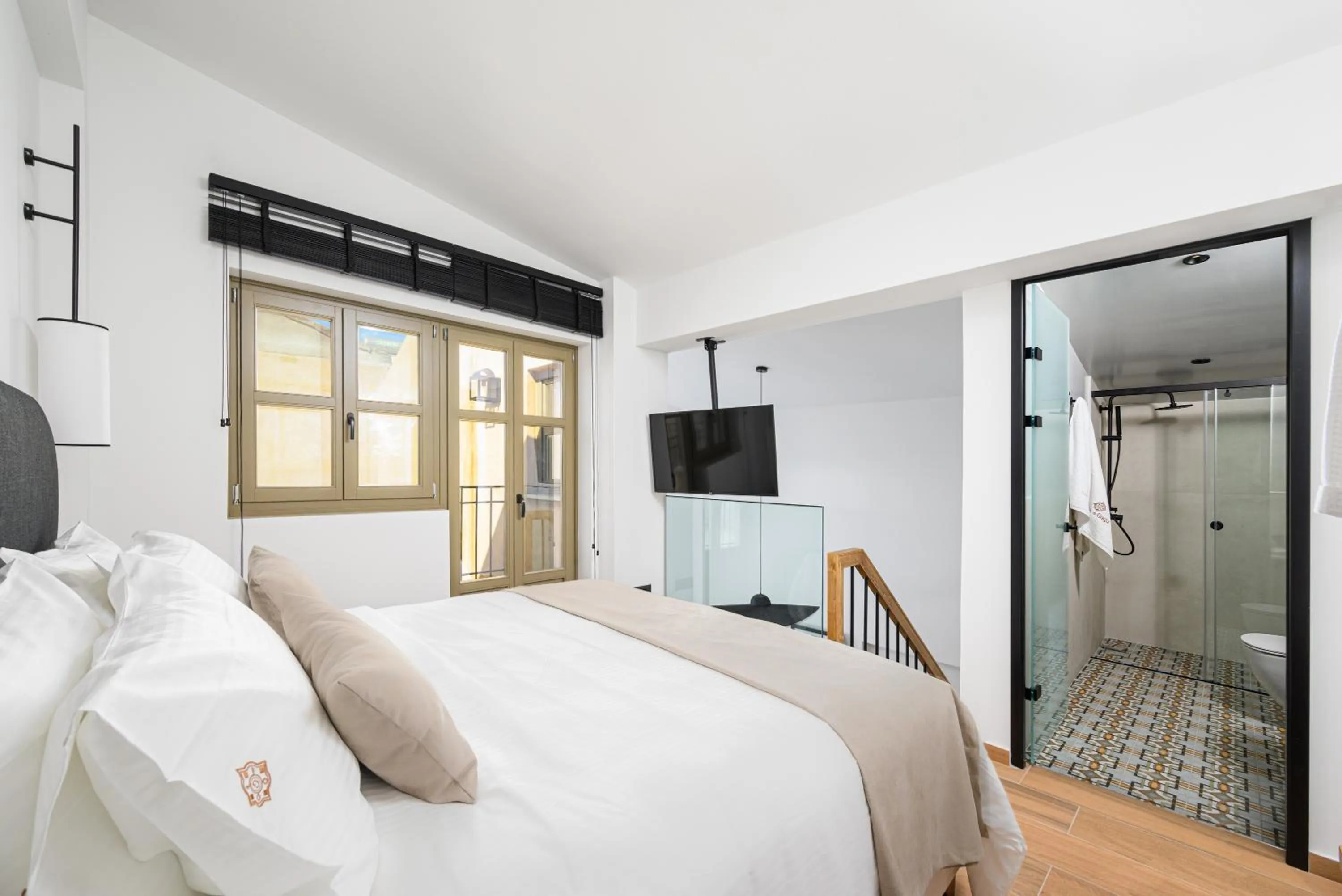 Bed in Casa di Gaga Luxury Suites